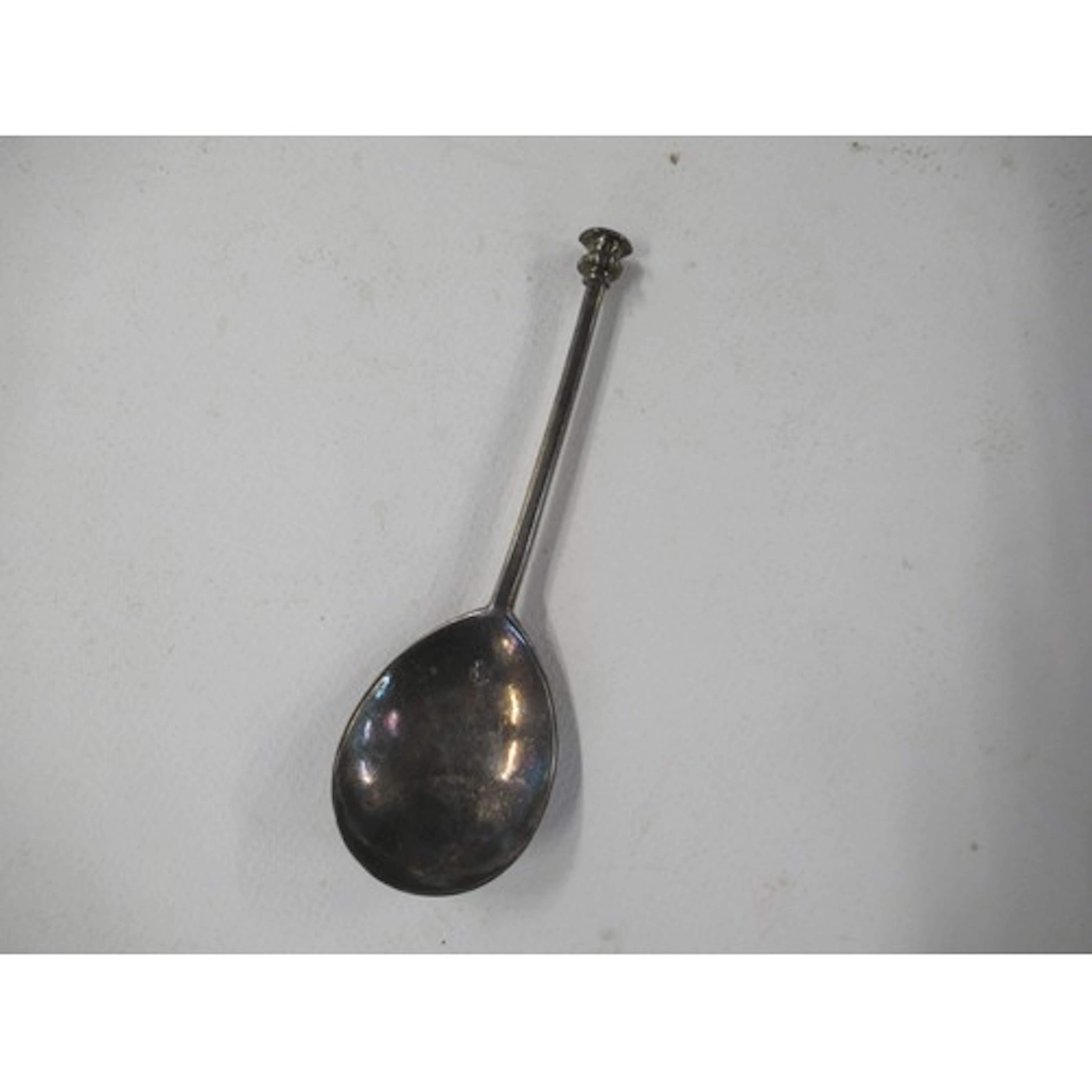 An antique silver seal top spoon, weight 1oz