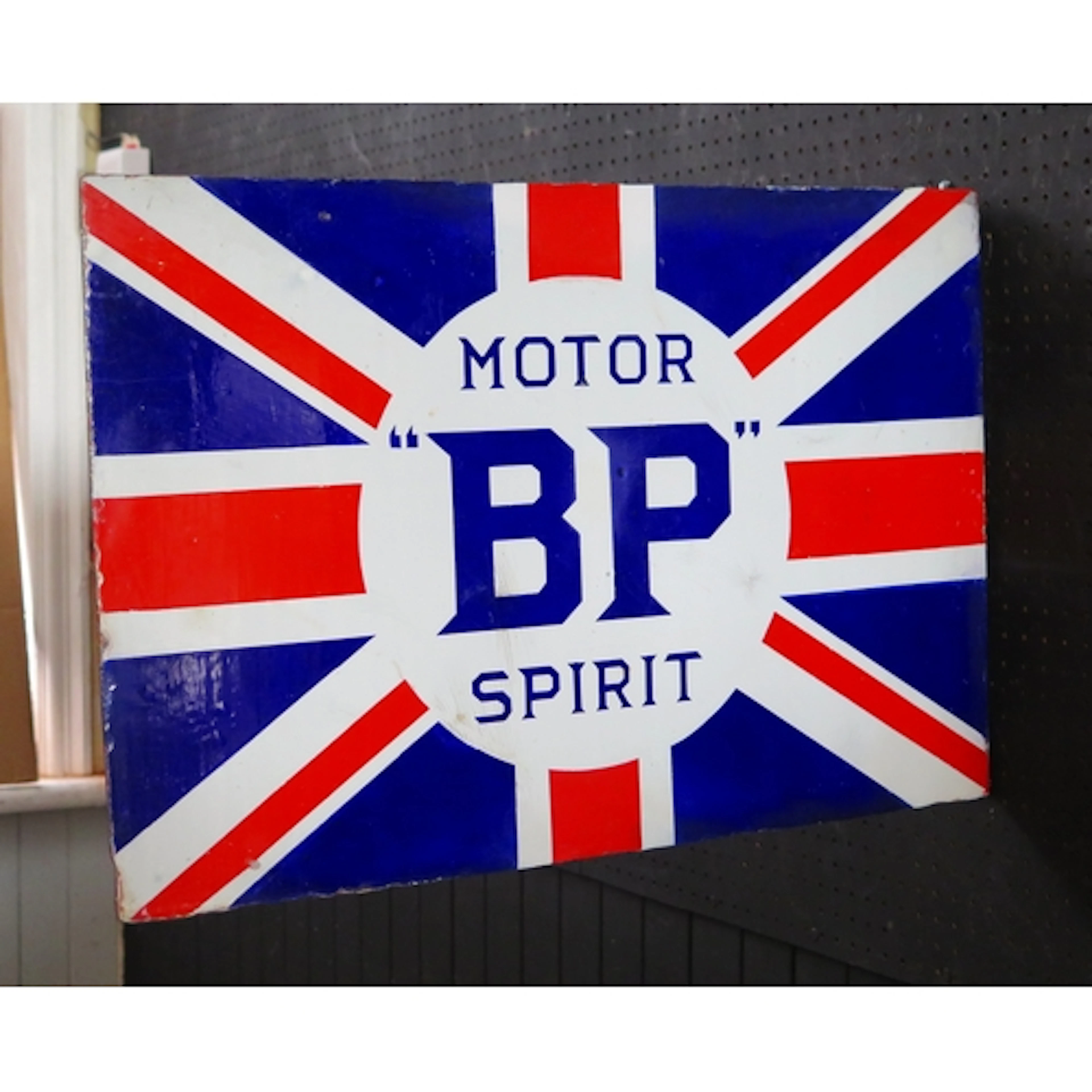 "BP Motor Spirit" - An enamel double-sided advertising sign,...
