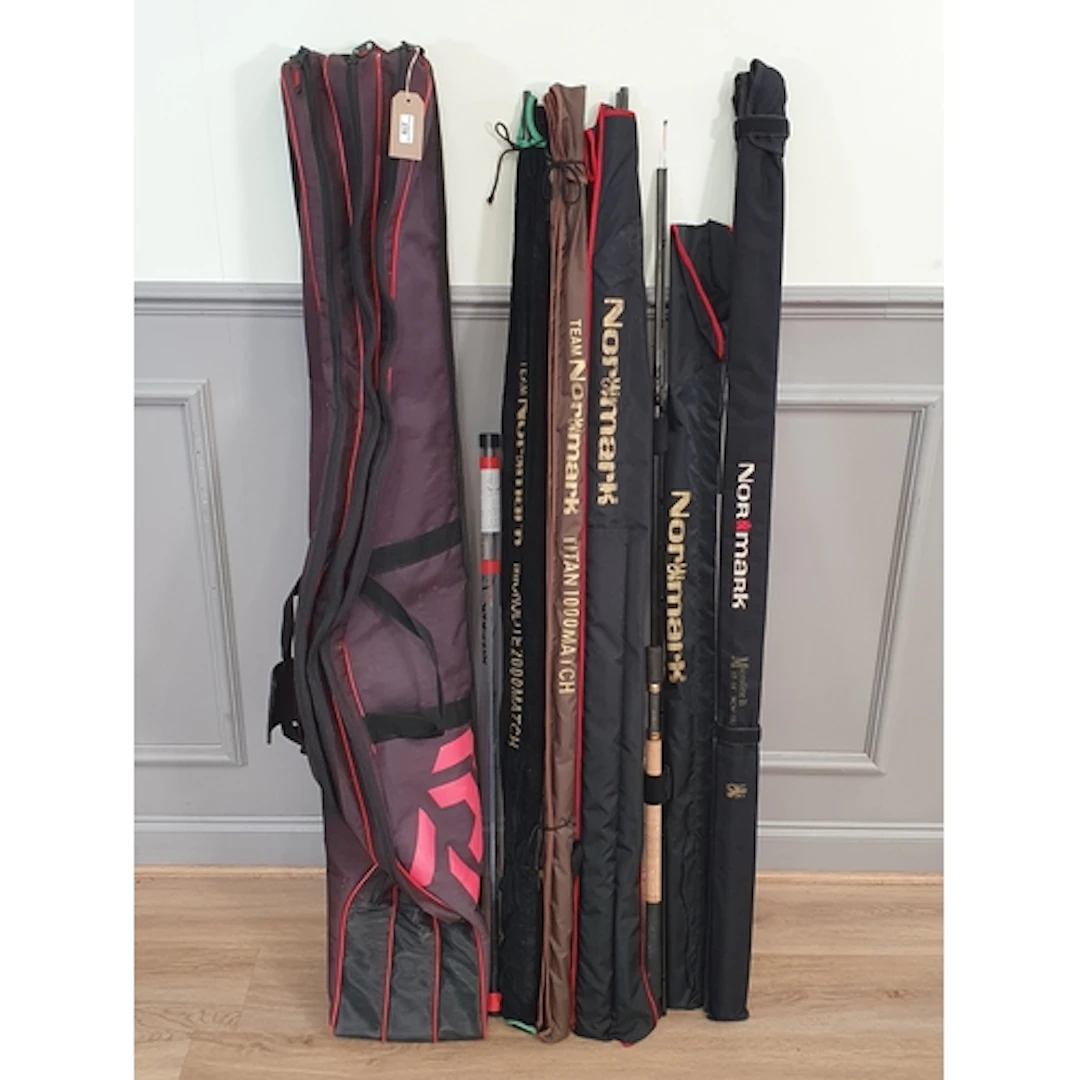 A Team Normark Microlite 2000 Match Rod, a Team Normark Tita...