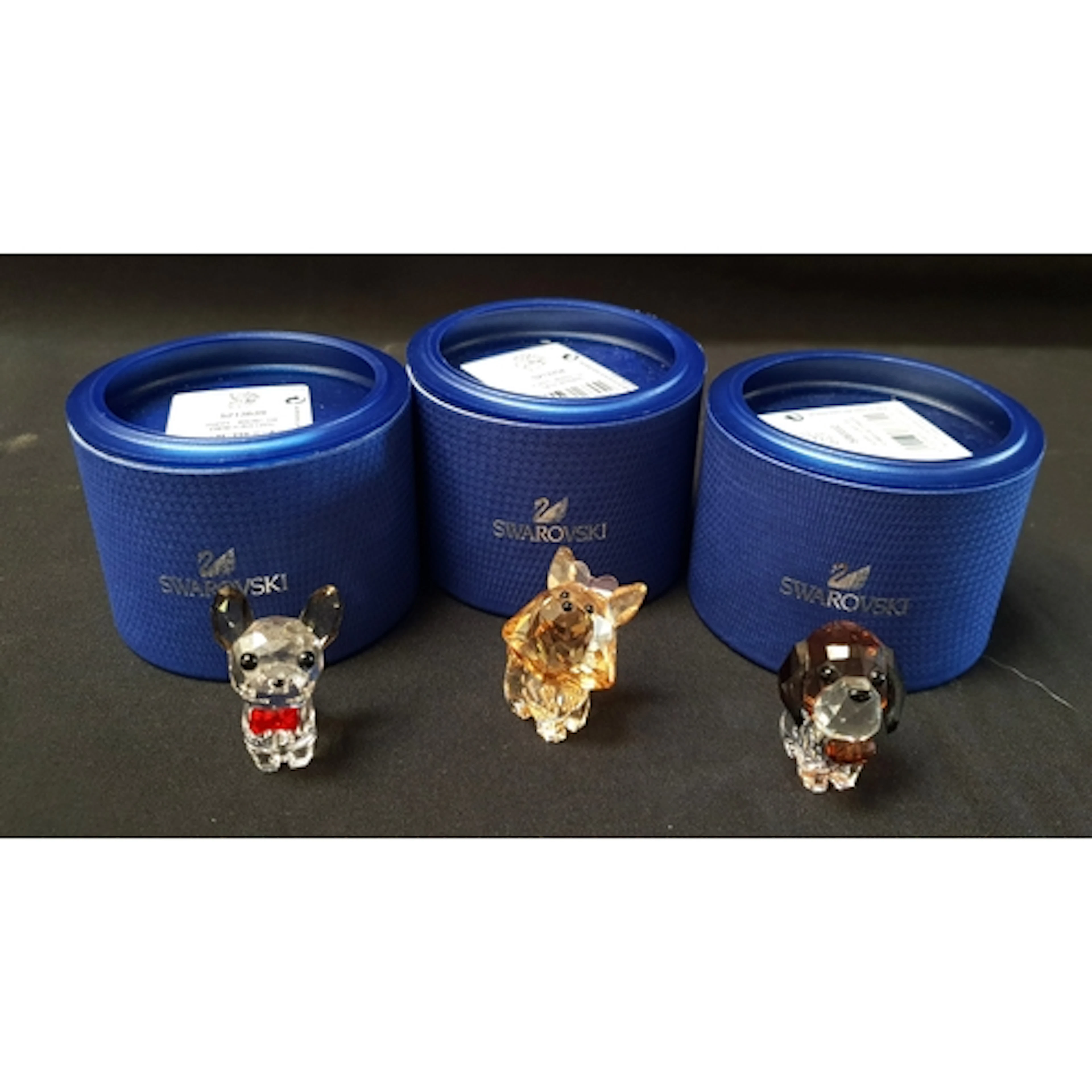 THREE SWAROVSKI PUPPY DOG FIGURINES comprising 'Lovlot Pupp...