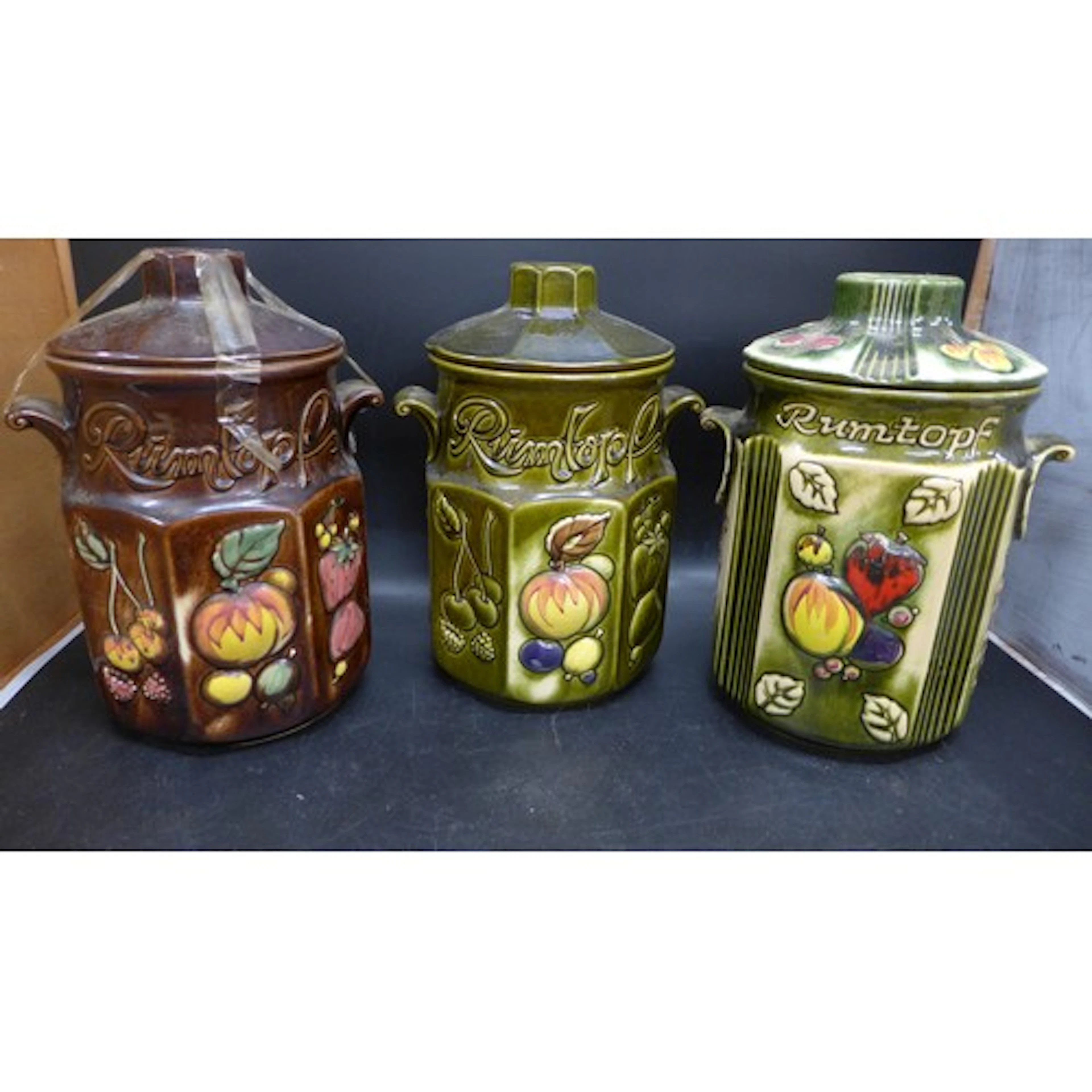 Three large West Germany Rumtopf lidded ceramic storage jars...