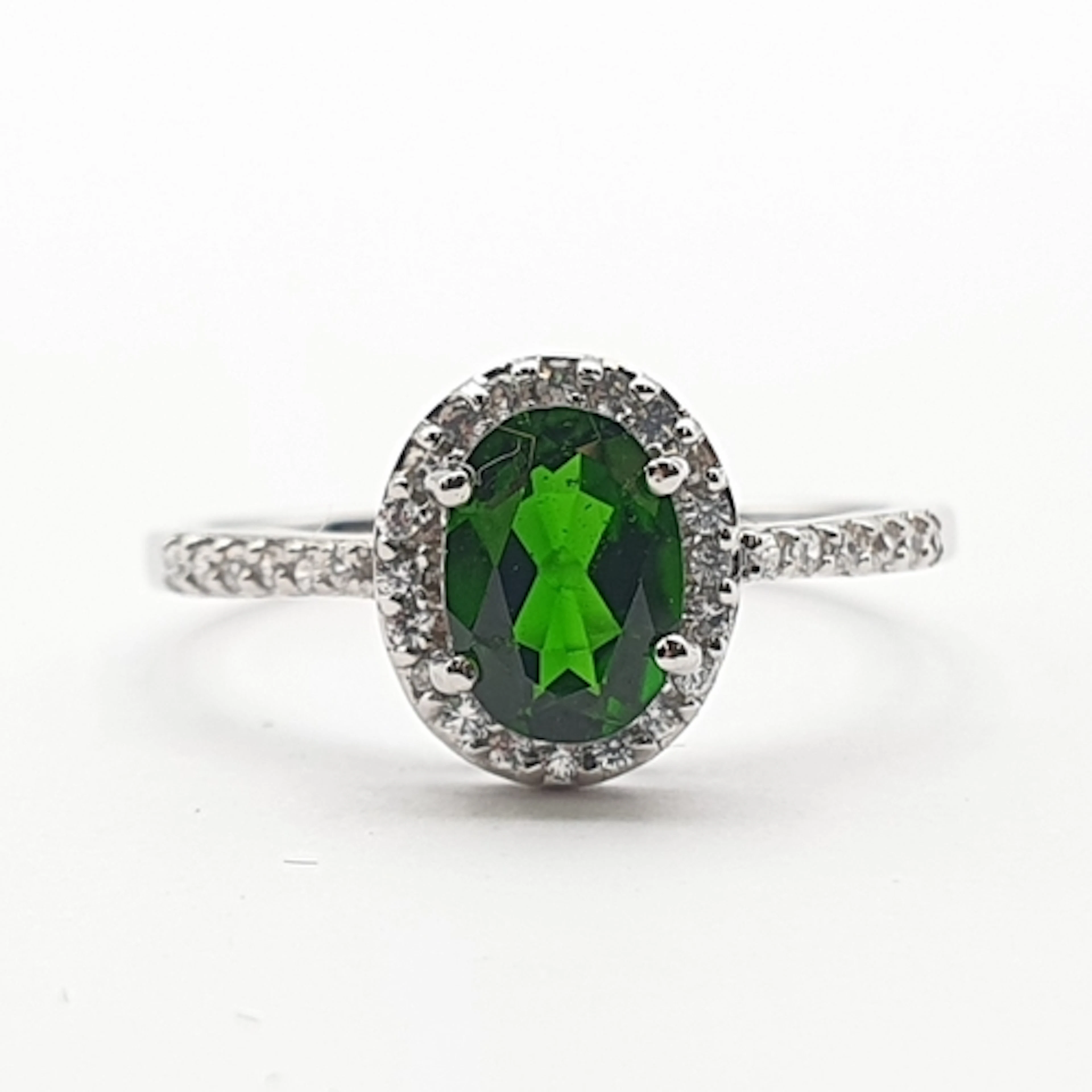 A Tsavorite Garnet and White Stone Cluster Ring in 9ct gold,...