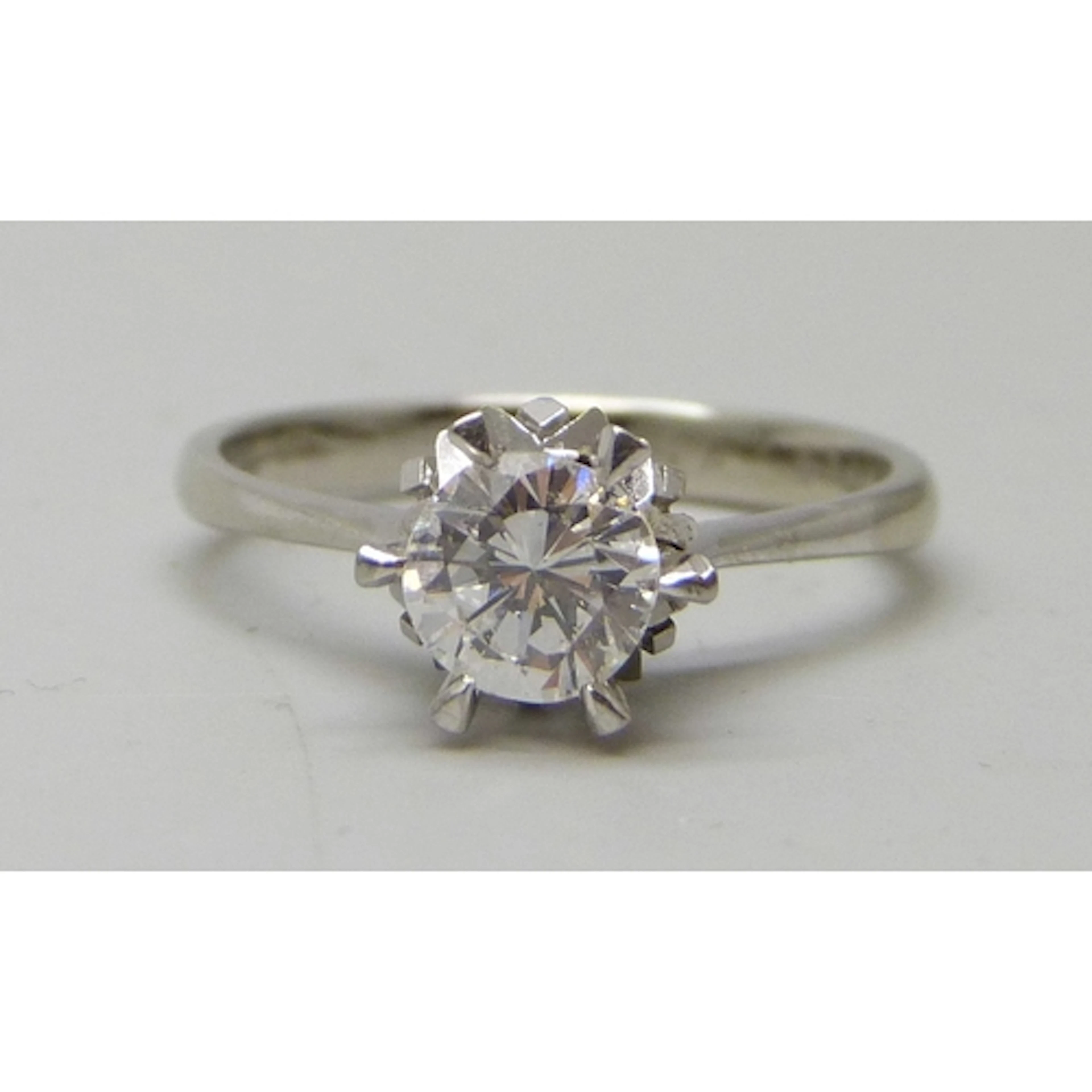An 18ct white gold diamond solitaire ring, partial 750 mark,...