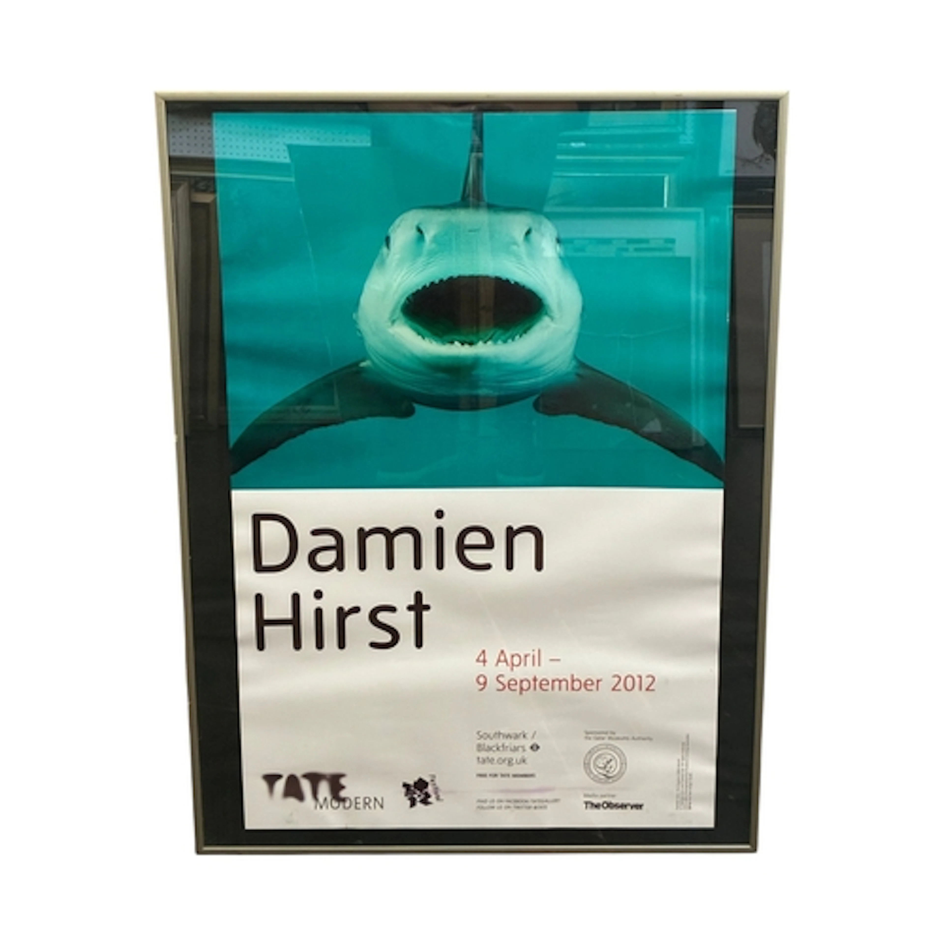A framed print of a Damien Hirst Tate Modern Exhibition post...