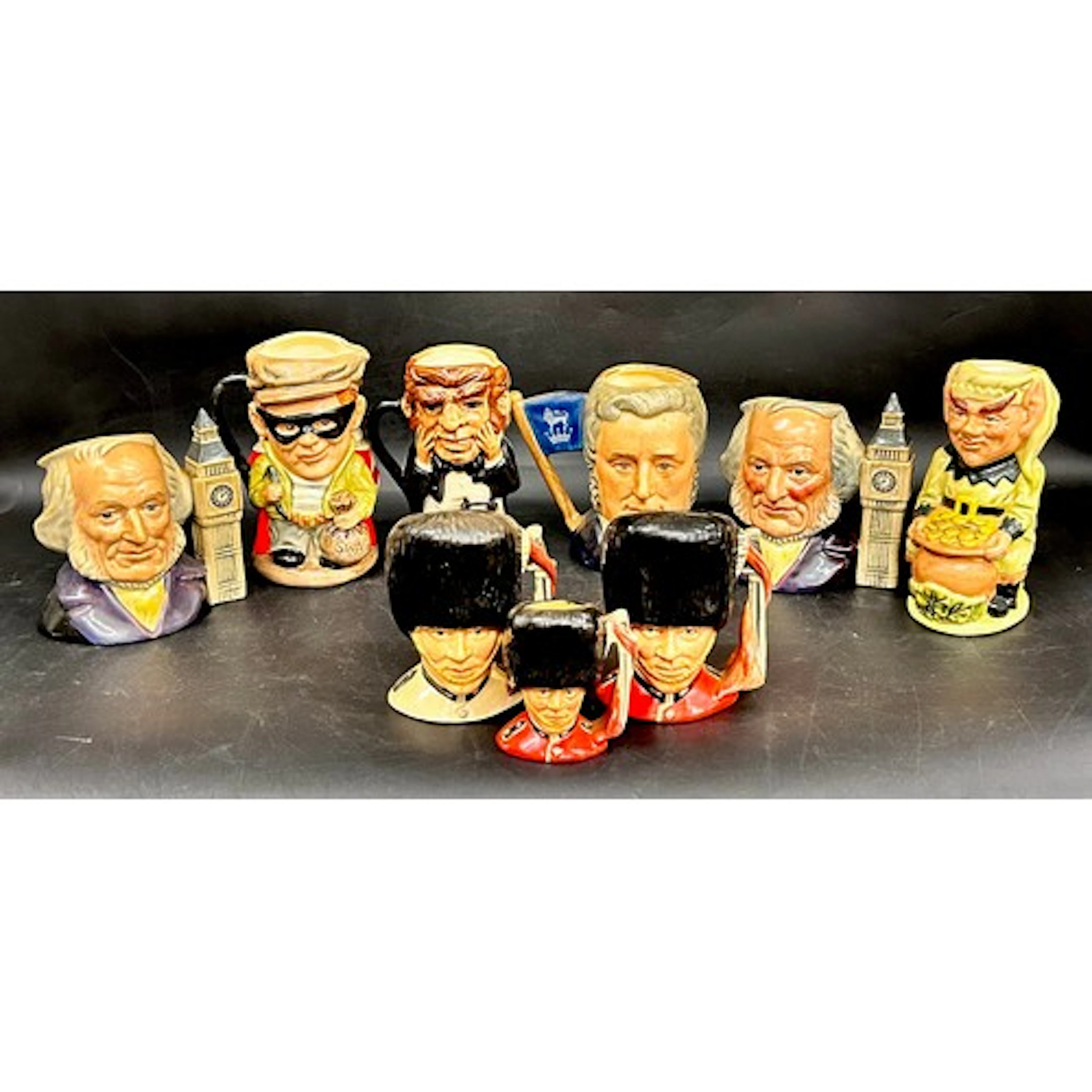 Collection of Royal Doulton character jugs medium and small ...