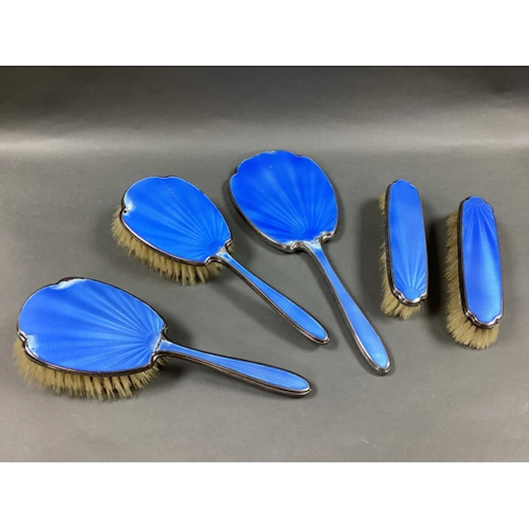 A Hallmarked Silver and Blue Enamel Five Piece dressing Tabl...