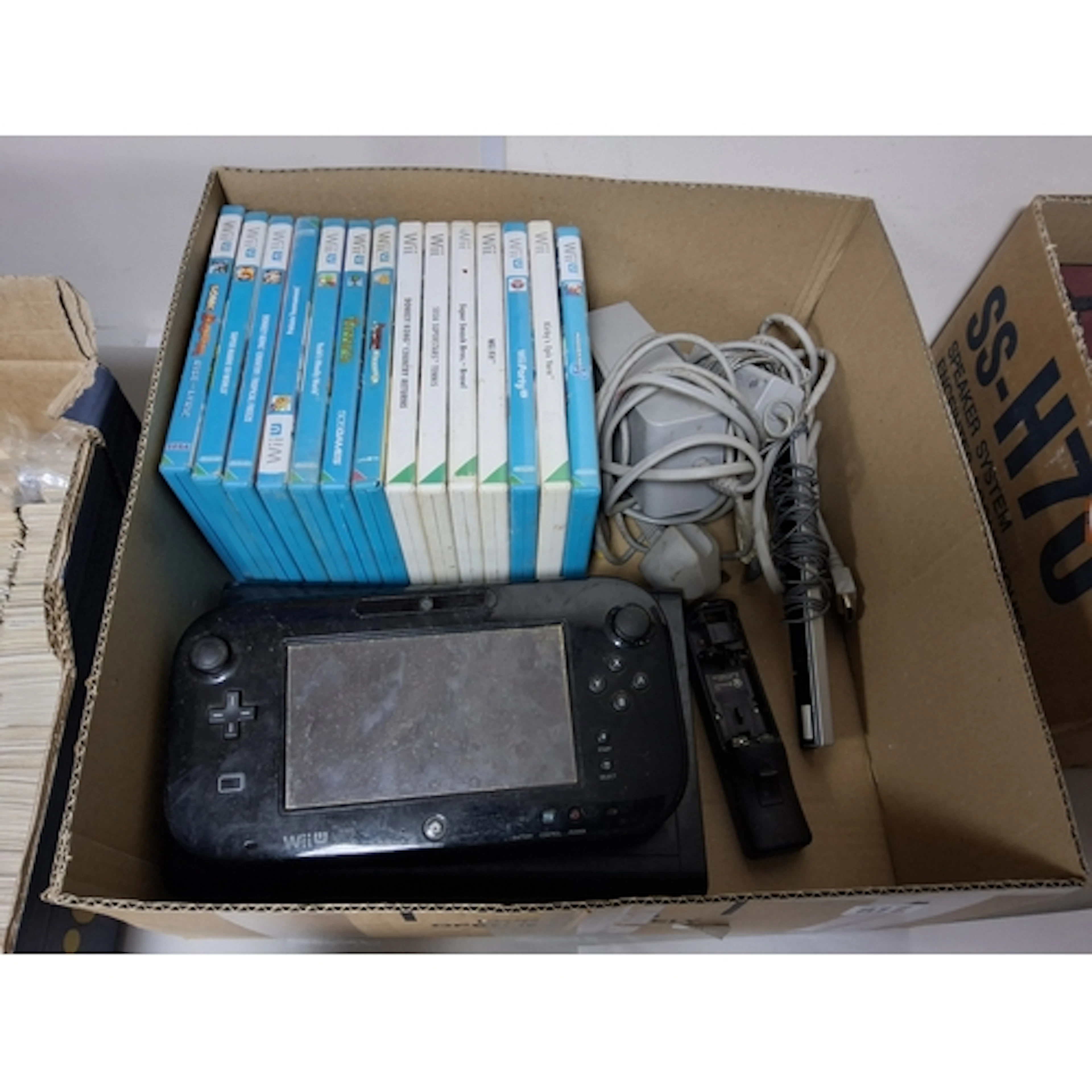 A NINTENDO WII U CONSOLE AND GAMES, includes Donkey Kong Cou...
