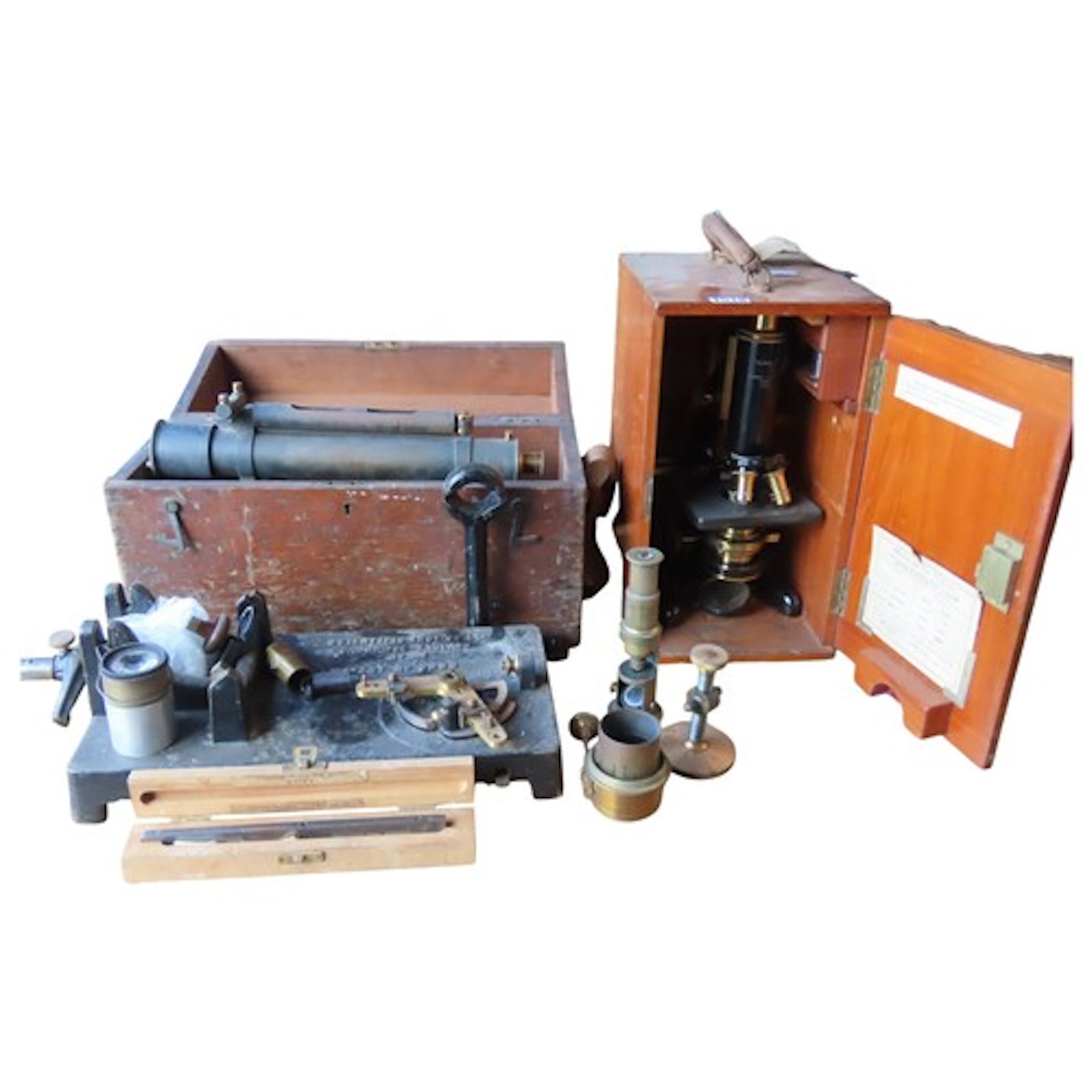 A vintage cased Watson "service" microscope number 72218 tog...