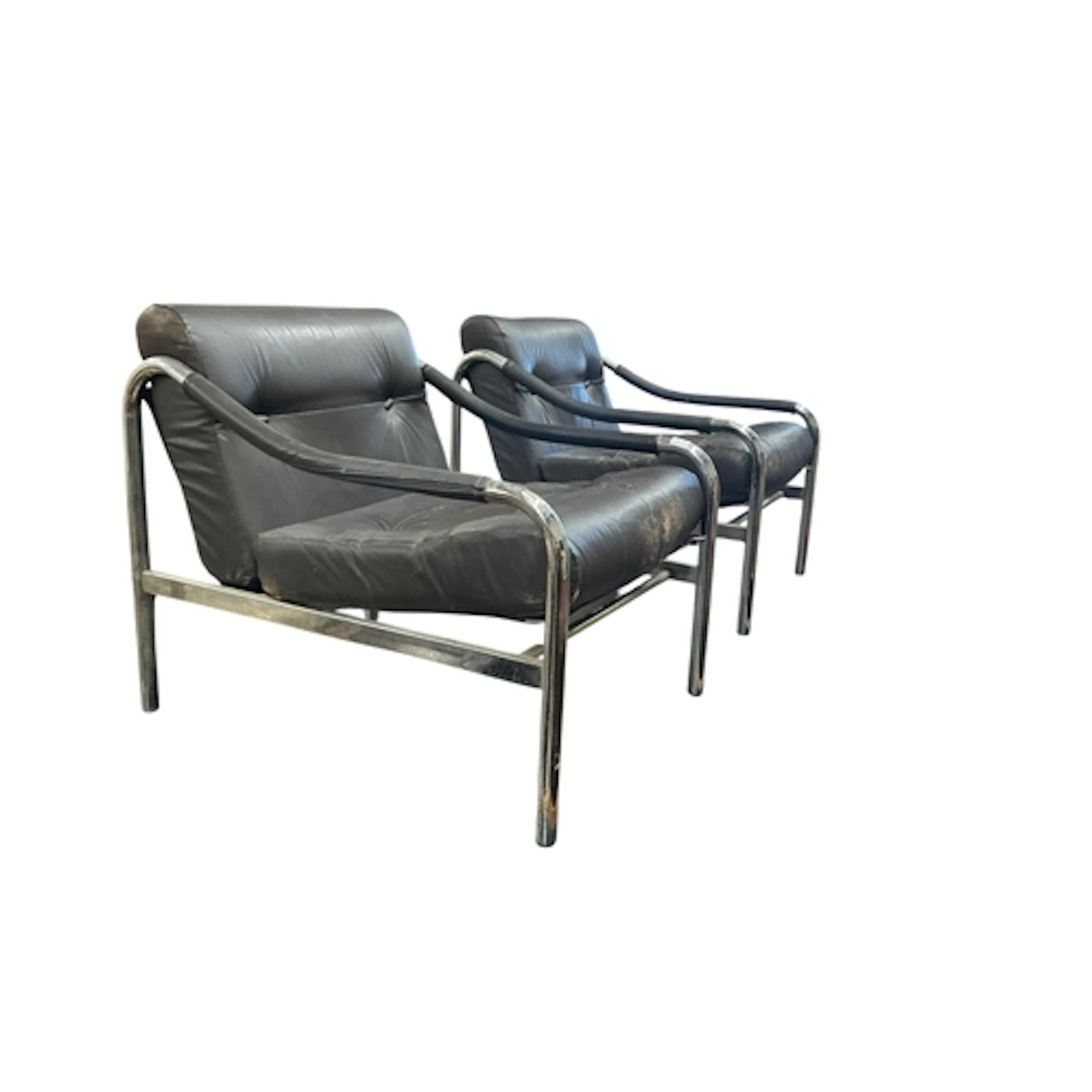 A pair of Pieff chrome and leather lounge chairs, width 60cm...