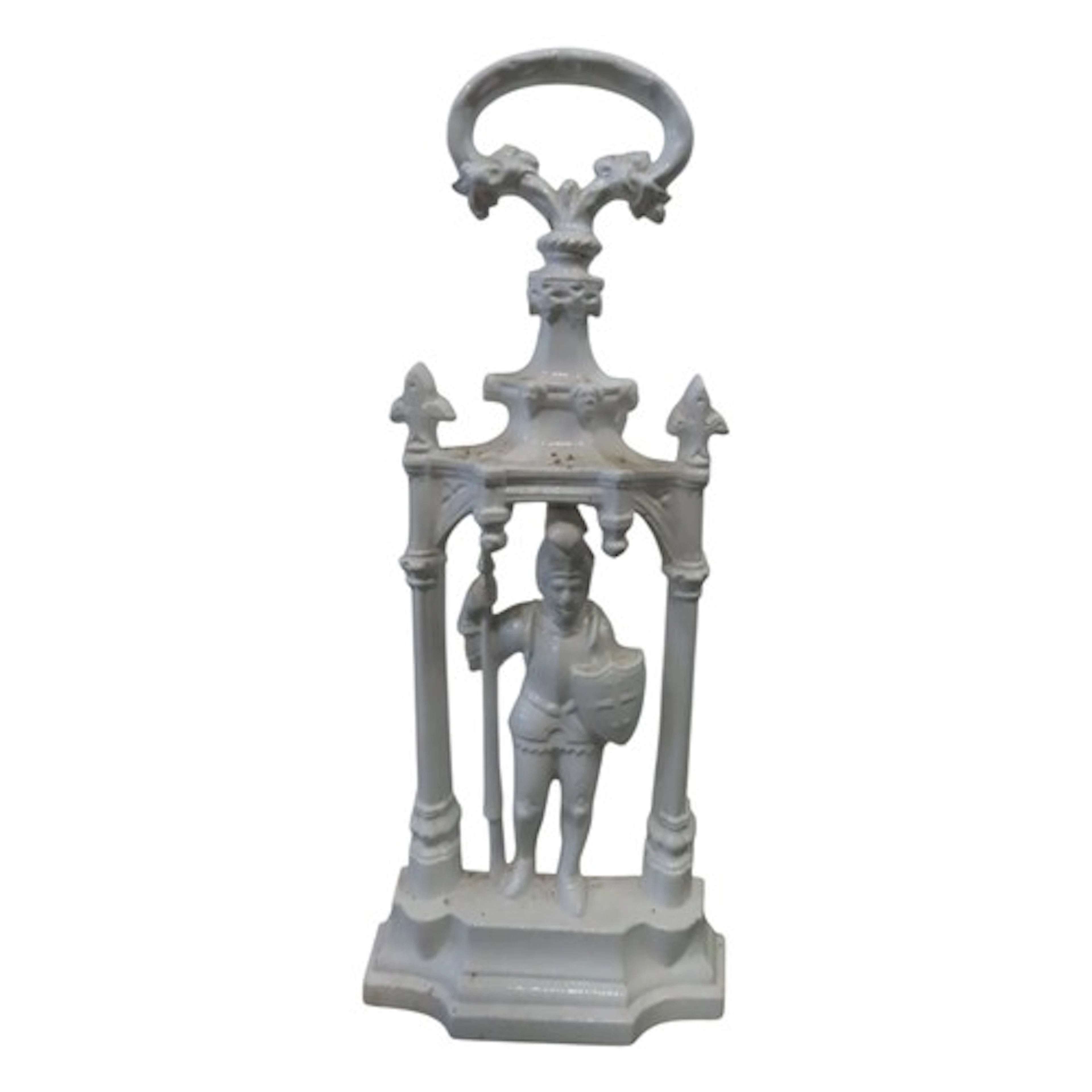 A painted cast iron door stop in the form of a knight within...