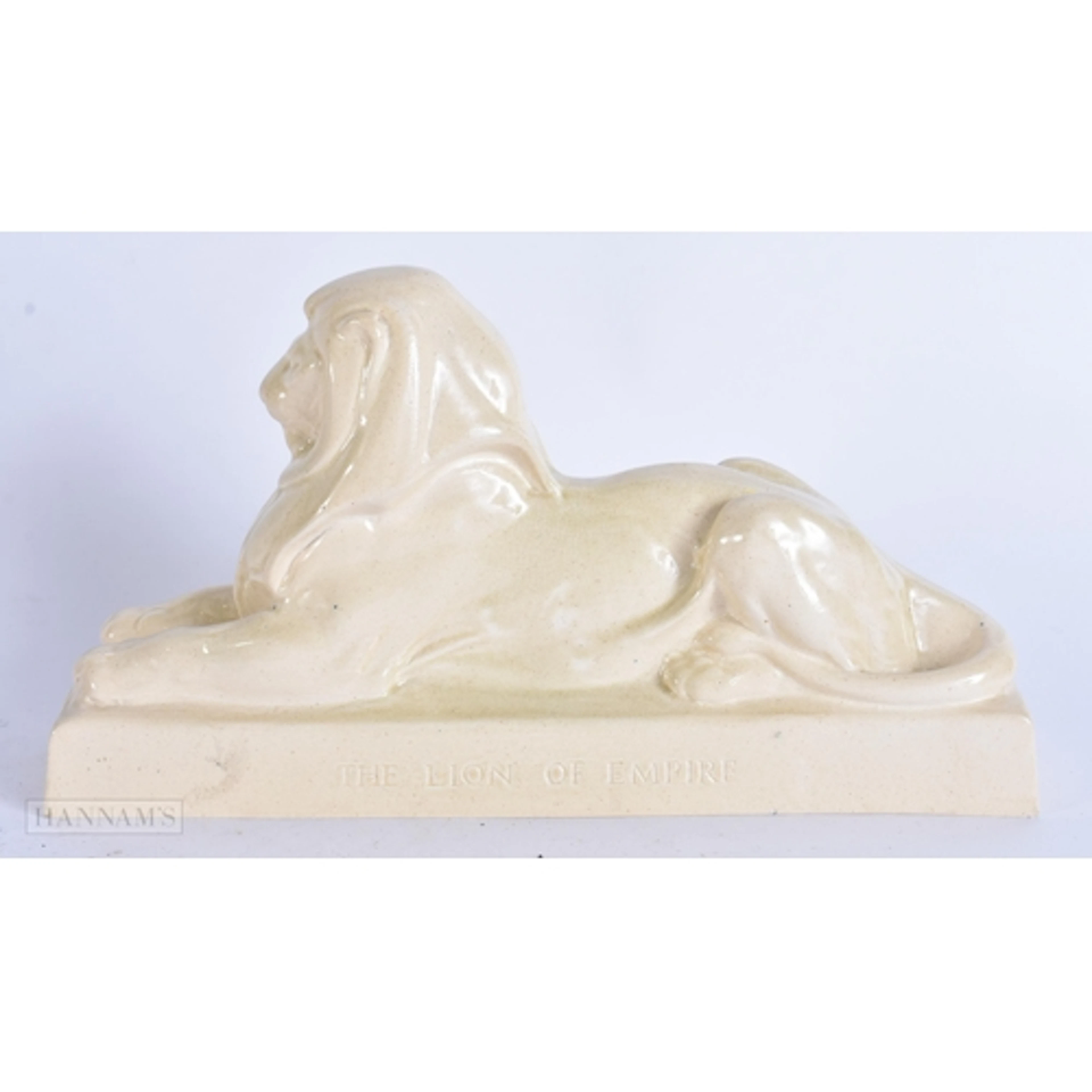 AN ART DECO ASHTEAD POTTERY WEMBLEY EXHIBITION LION C1924-25...