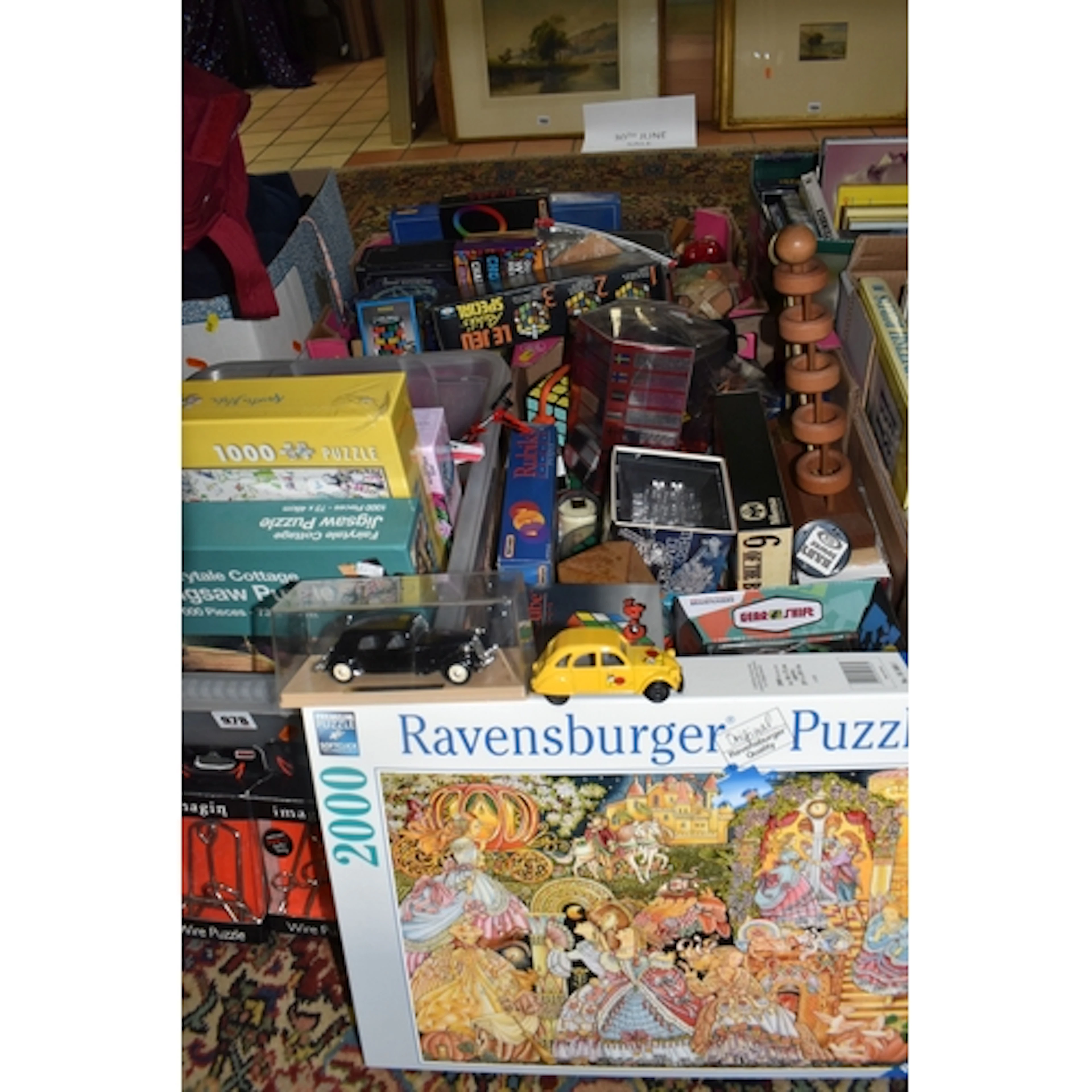 THREE BOXES OF PUZZLES AND GAMES, many boxed, to include Rub...