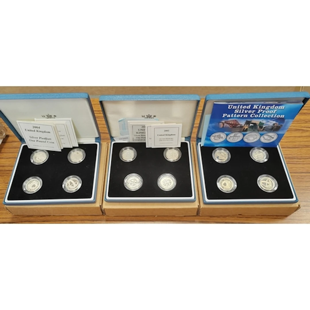 Range of boxed silver proof piedforts FDC, includes 2004-200...