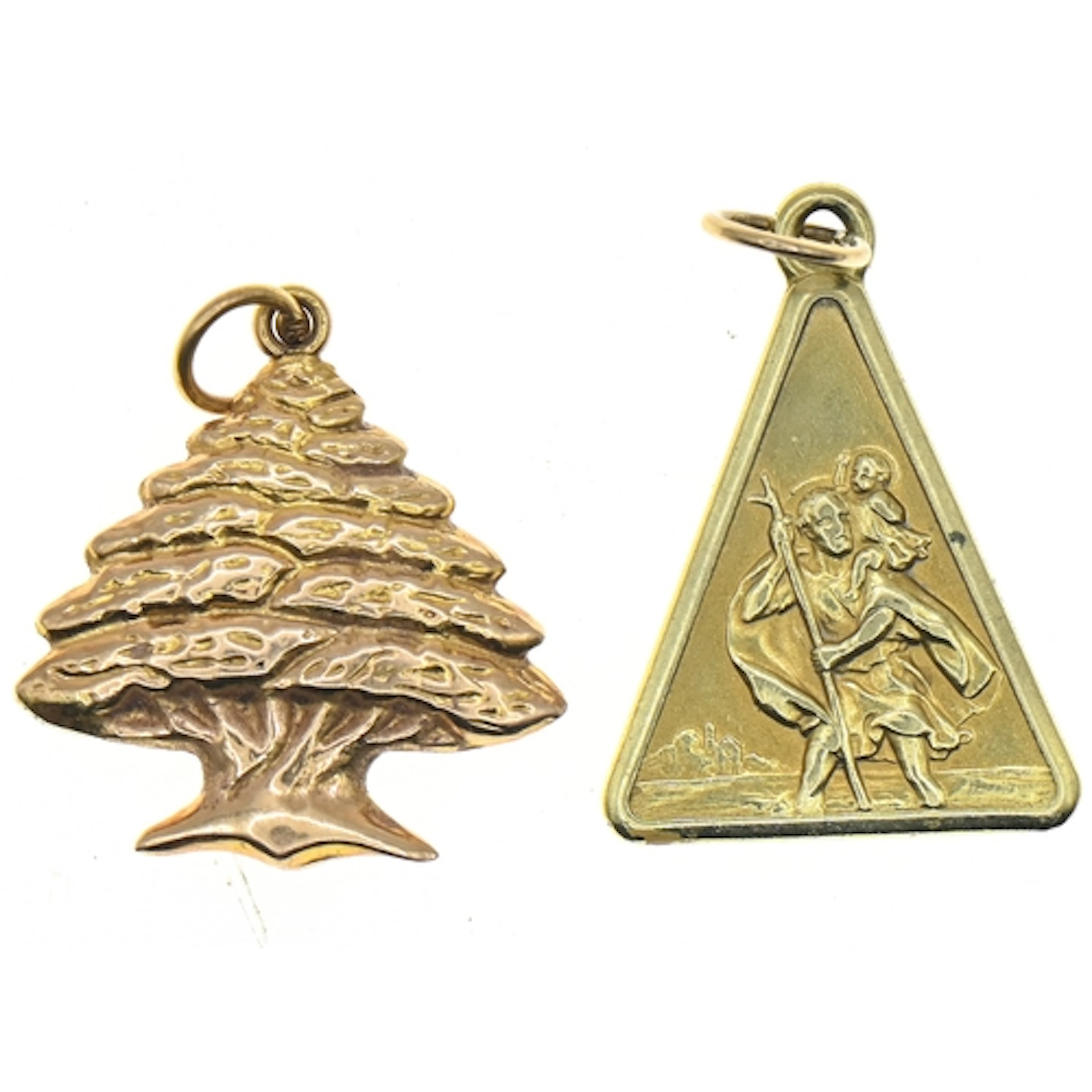 Two yellow metal pendants, including a triangular St Christo...