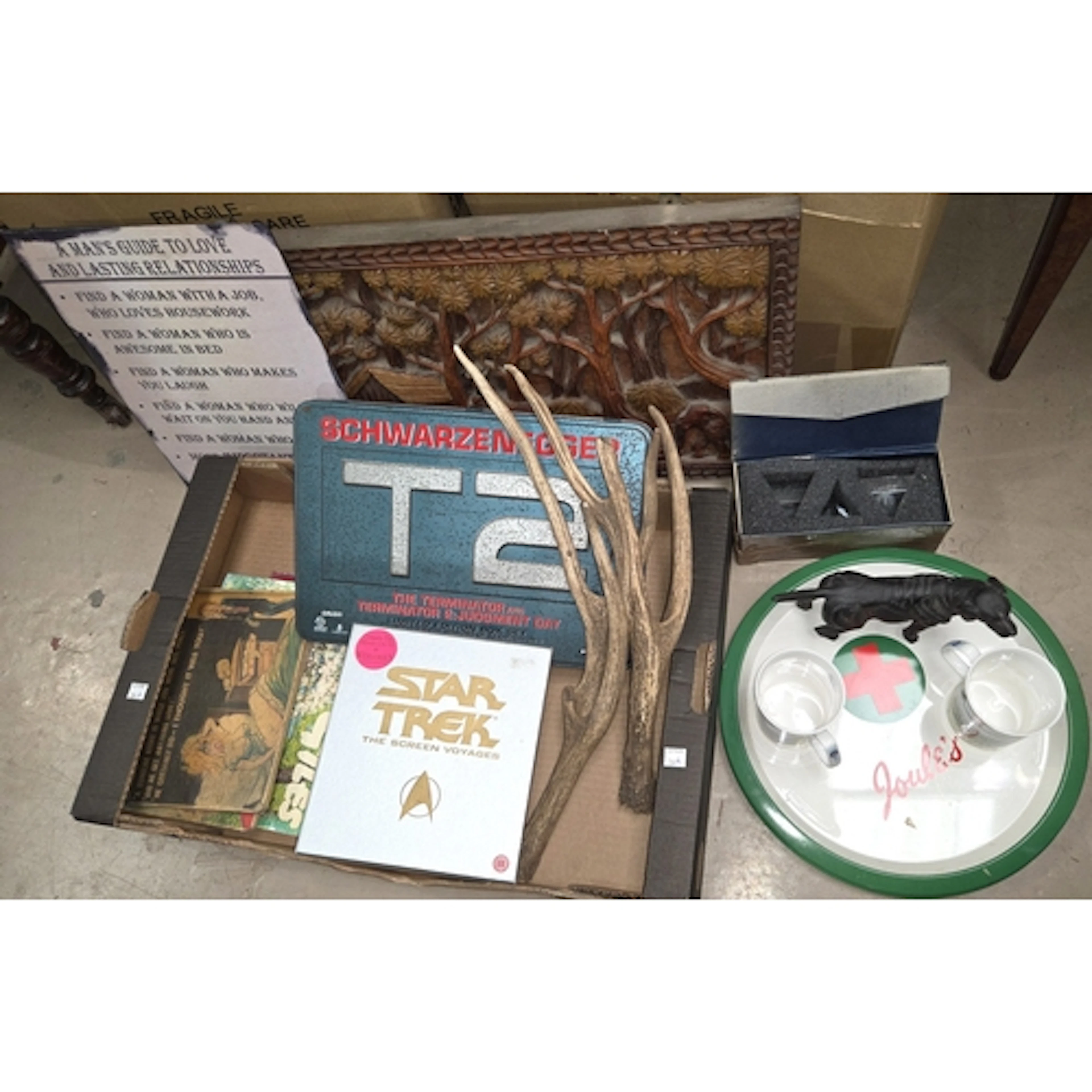 A Royal Doulton Labrador, Star Trek and T2 videos, a carved ...
