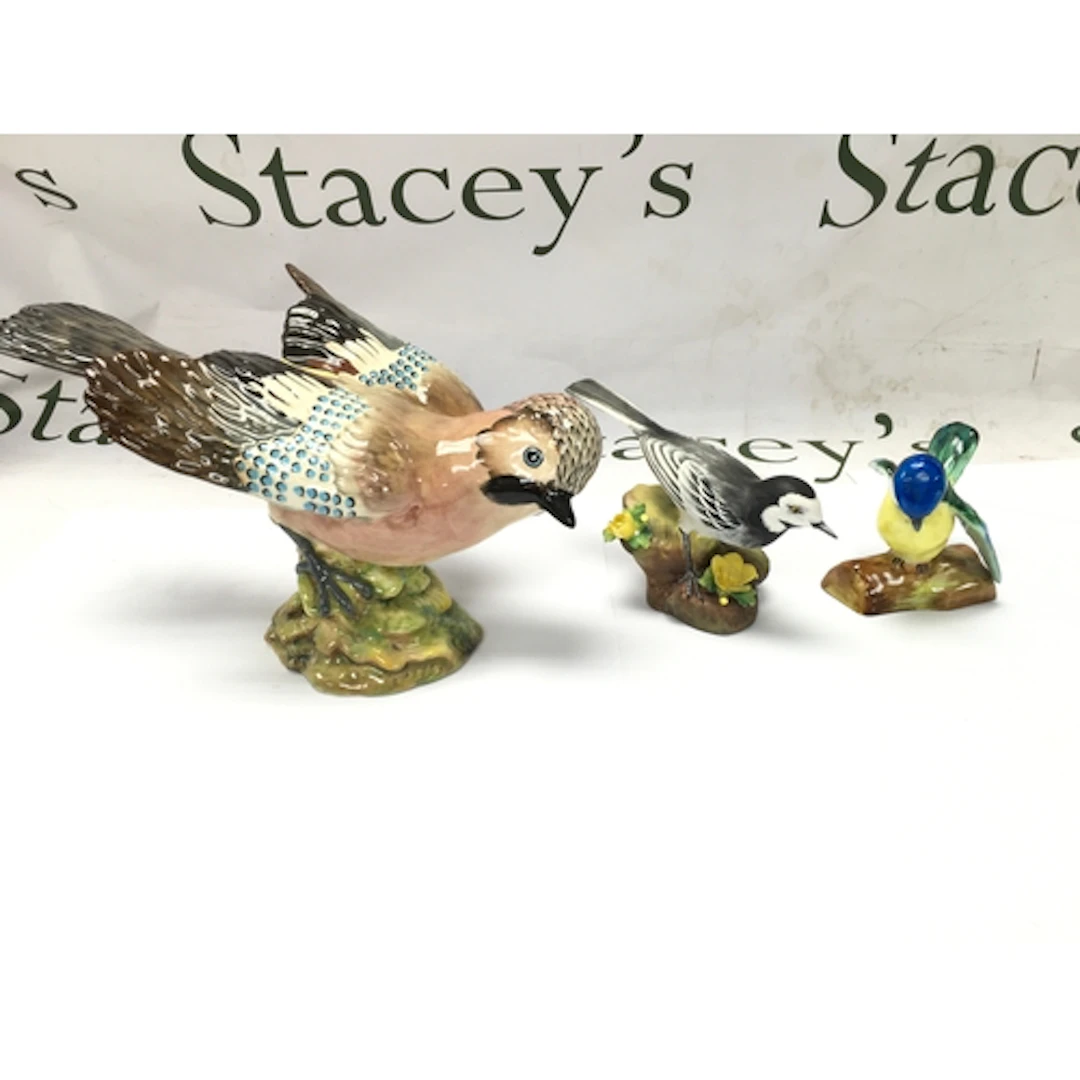 A Beswick Jay Figurine (Model No. 1219) along with two ...