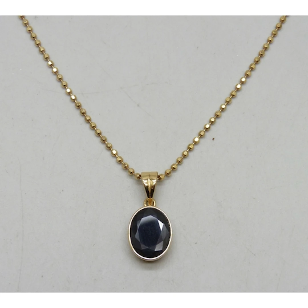 An 18ct gold necklace chain, with an 18ct gold and black sto...