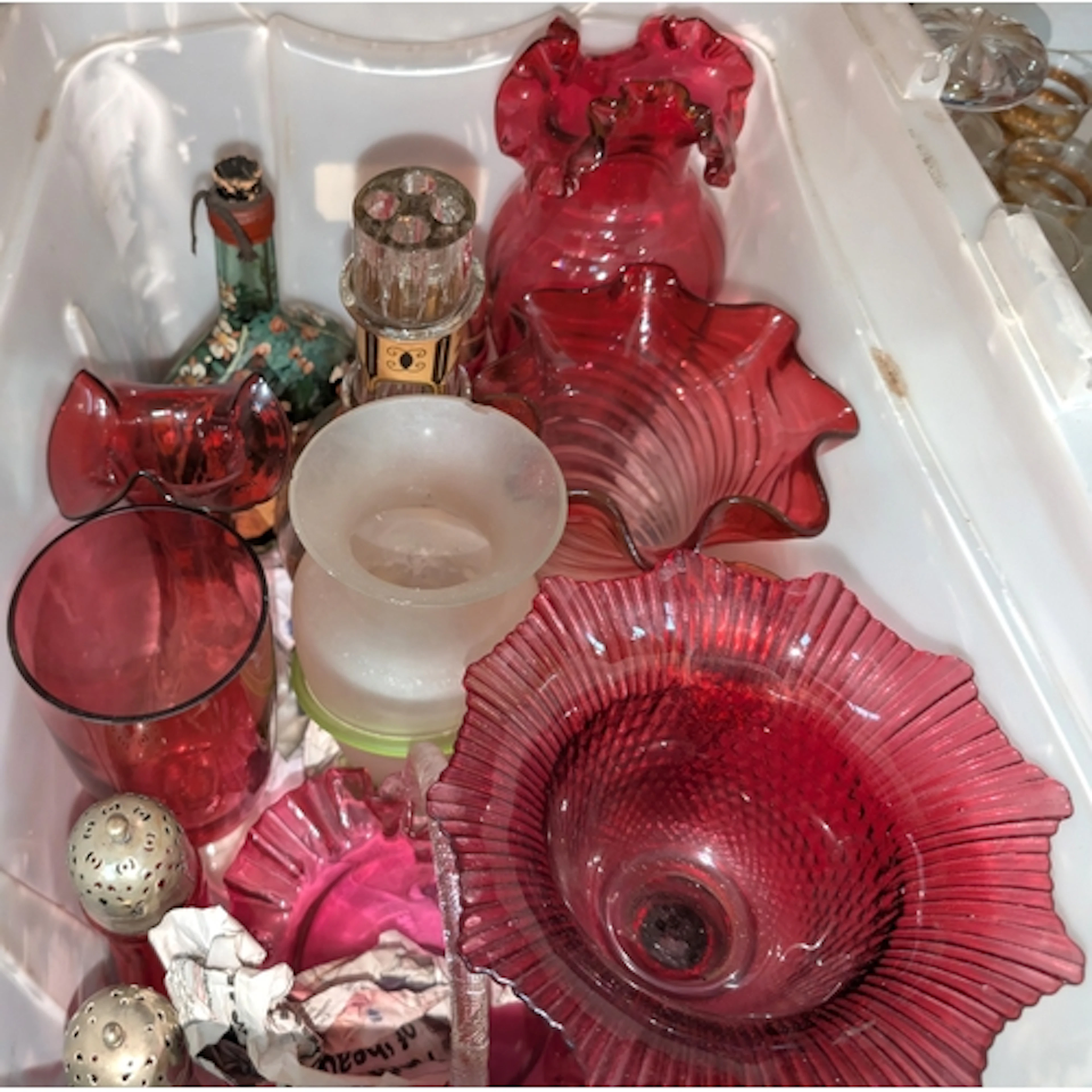 A group of larger cranberry vases and a selection of cut gla...