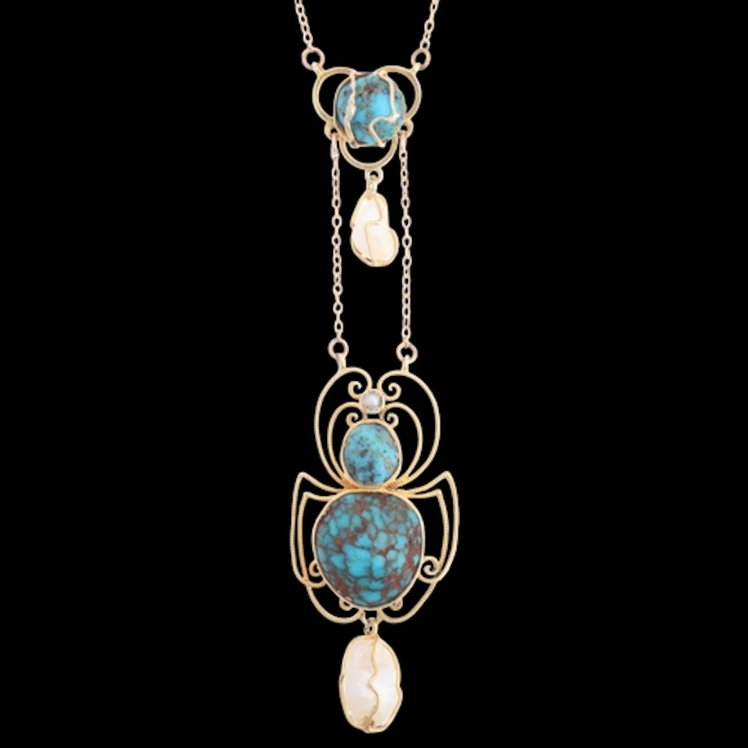 An Art Nouveau 15ct gold turquoise and pearl 'Spider' lavali...