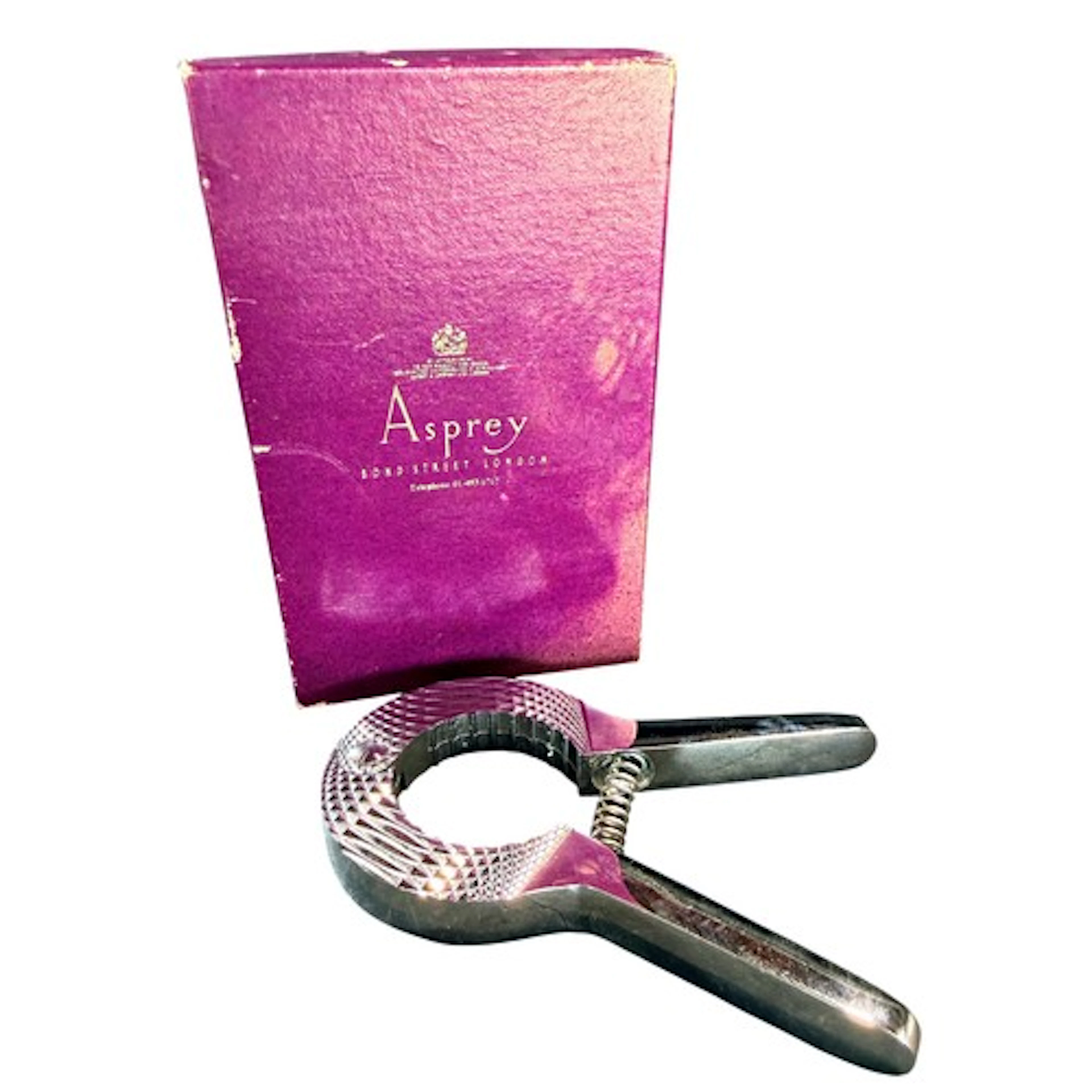 A 20th century plated champagne cork remover, unmarked, in A...