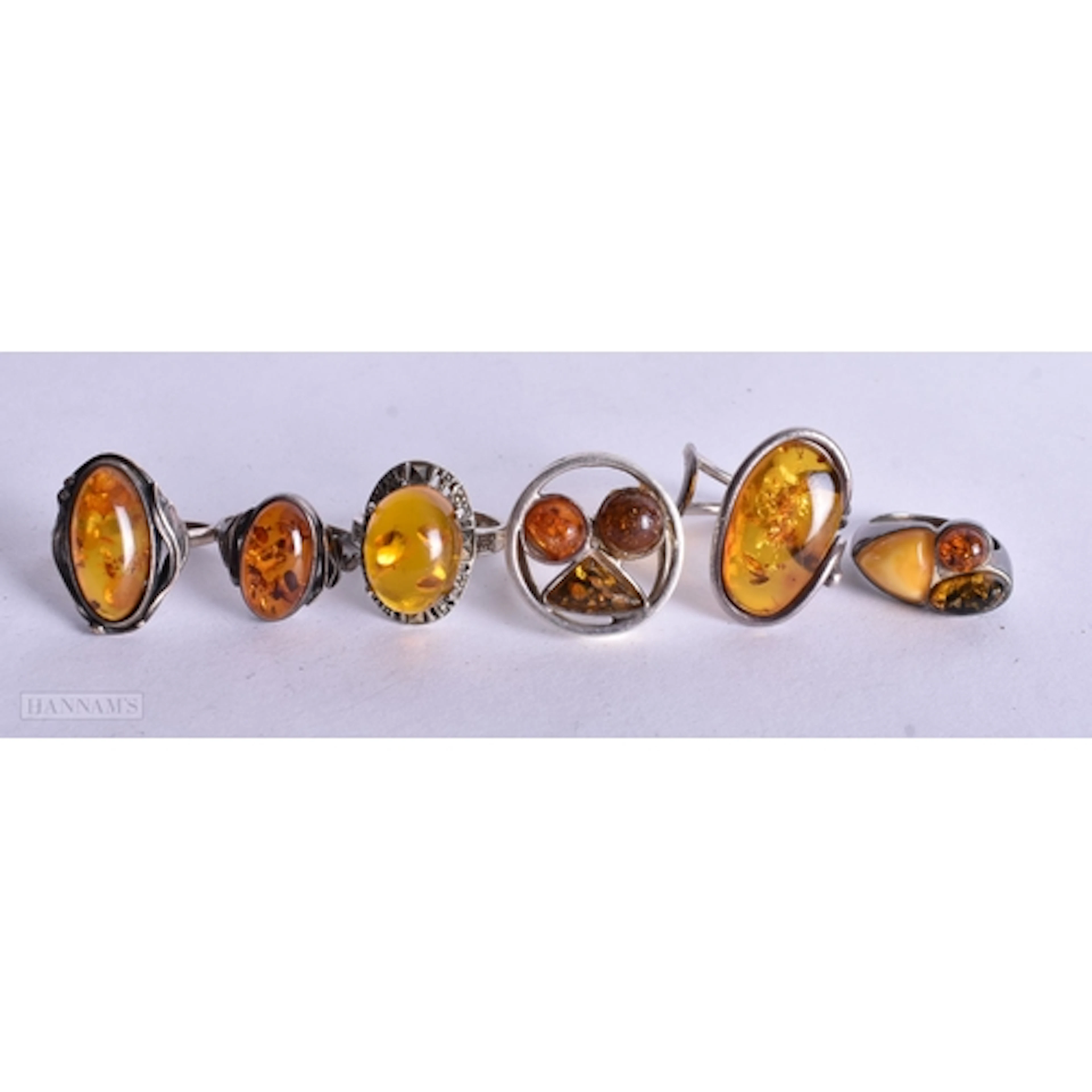 Collection of Sterling Silver Amber Rings inc. Butterscotch,...
