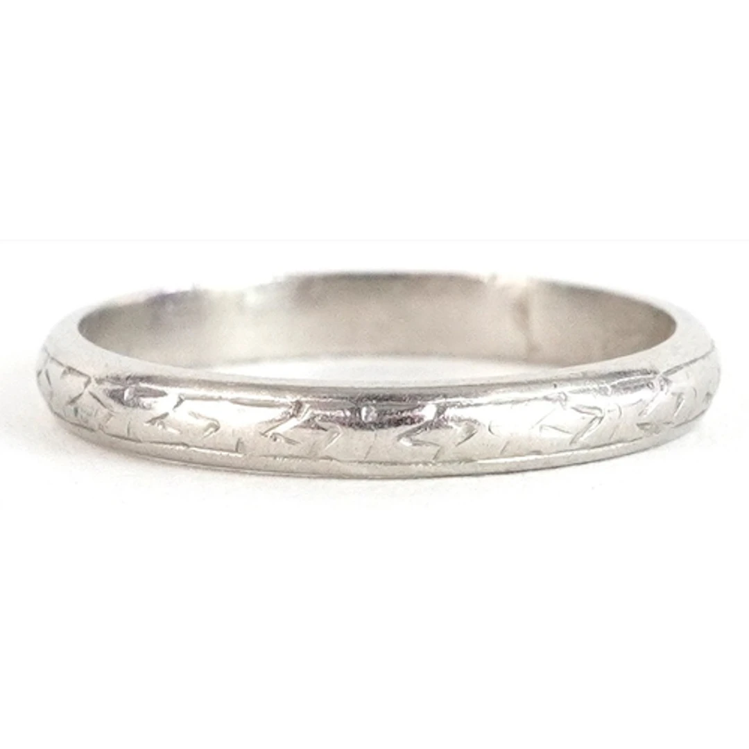 Platinum wedding band, size J, 2.6g.