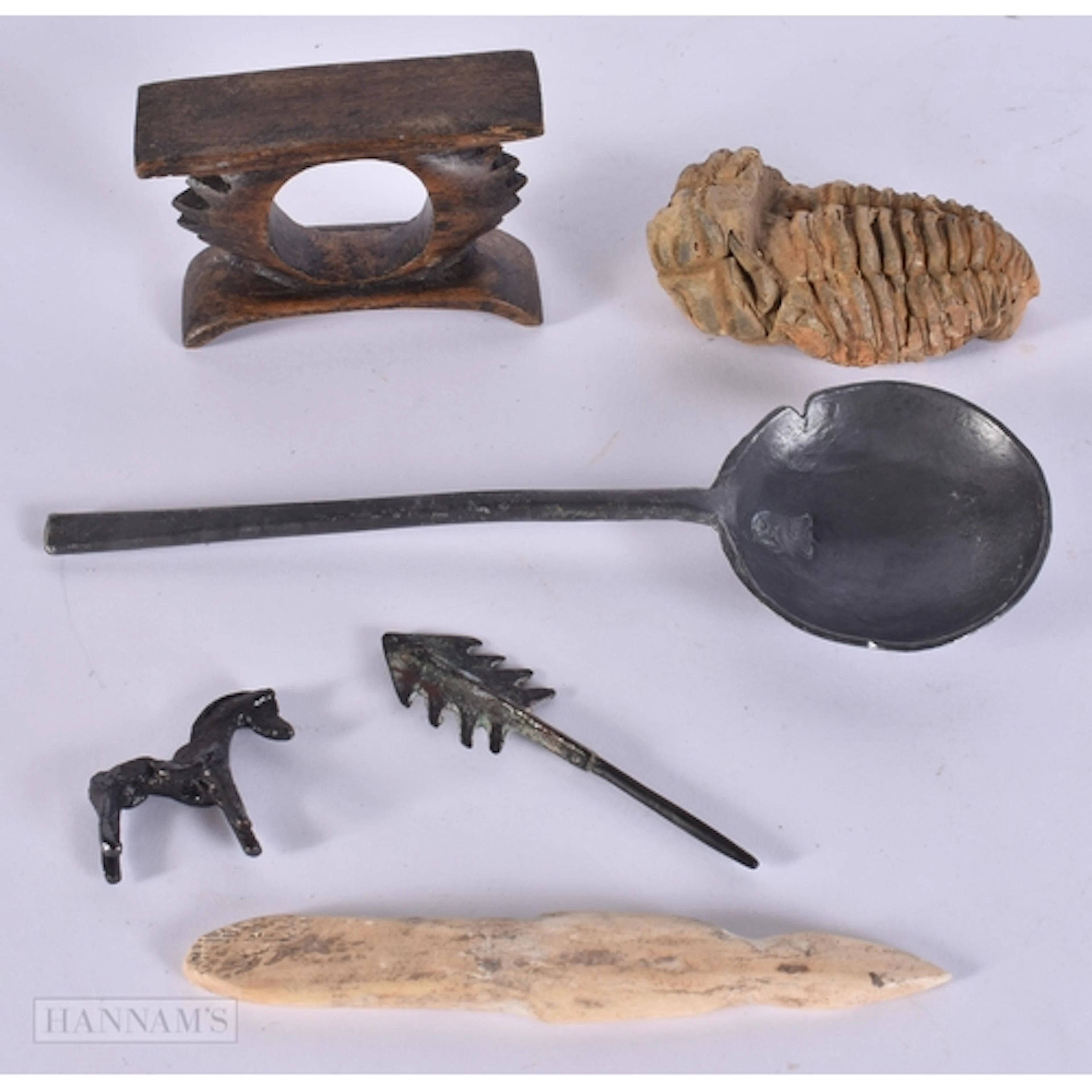 AN EARLY PEWTER SPOONS together with a fossil etc. (6)