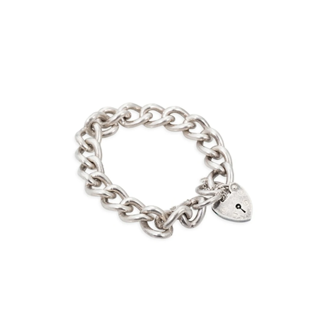 A SILVER CURB BRACELET, with padlock clasp, length 7"