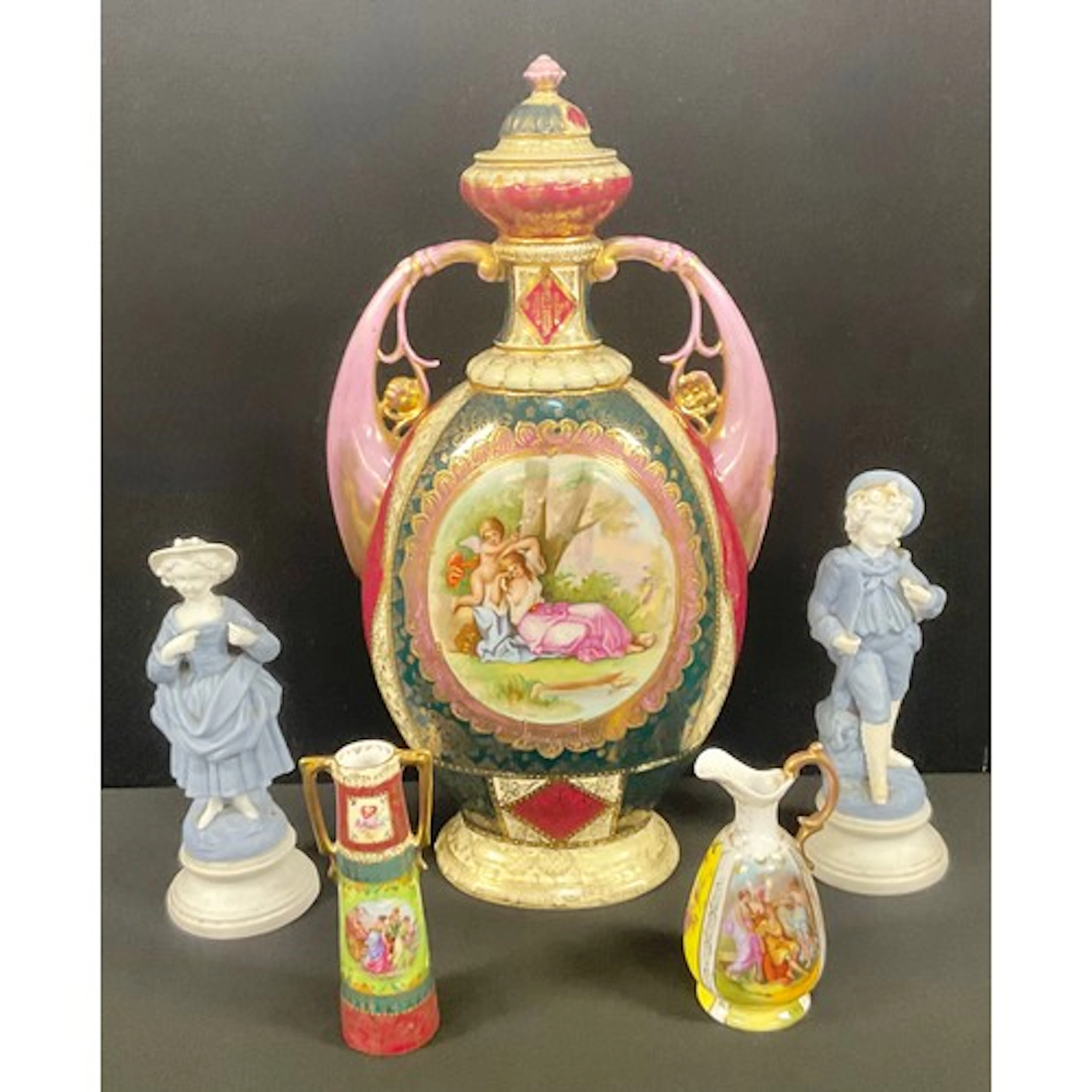 A tall Vienna two handled vase and cover, after Angelica Kau...