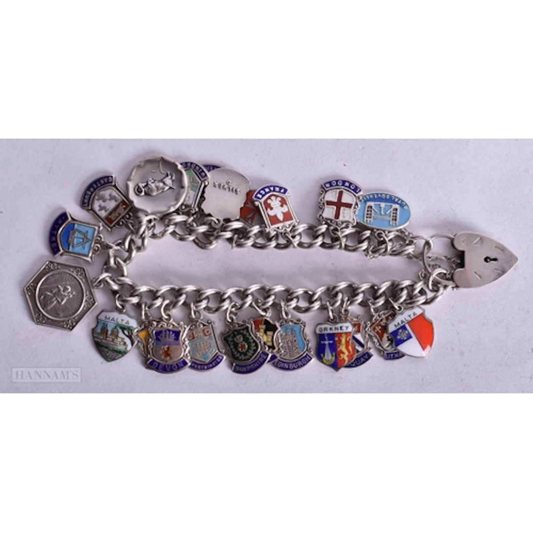 A SILVER CHARM BRACELET. 54 grams. 18 cm long.