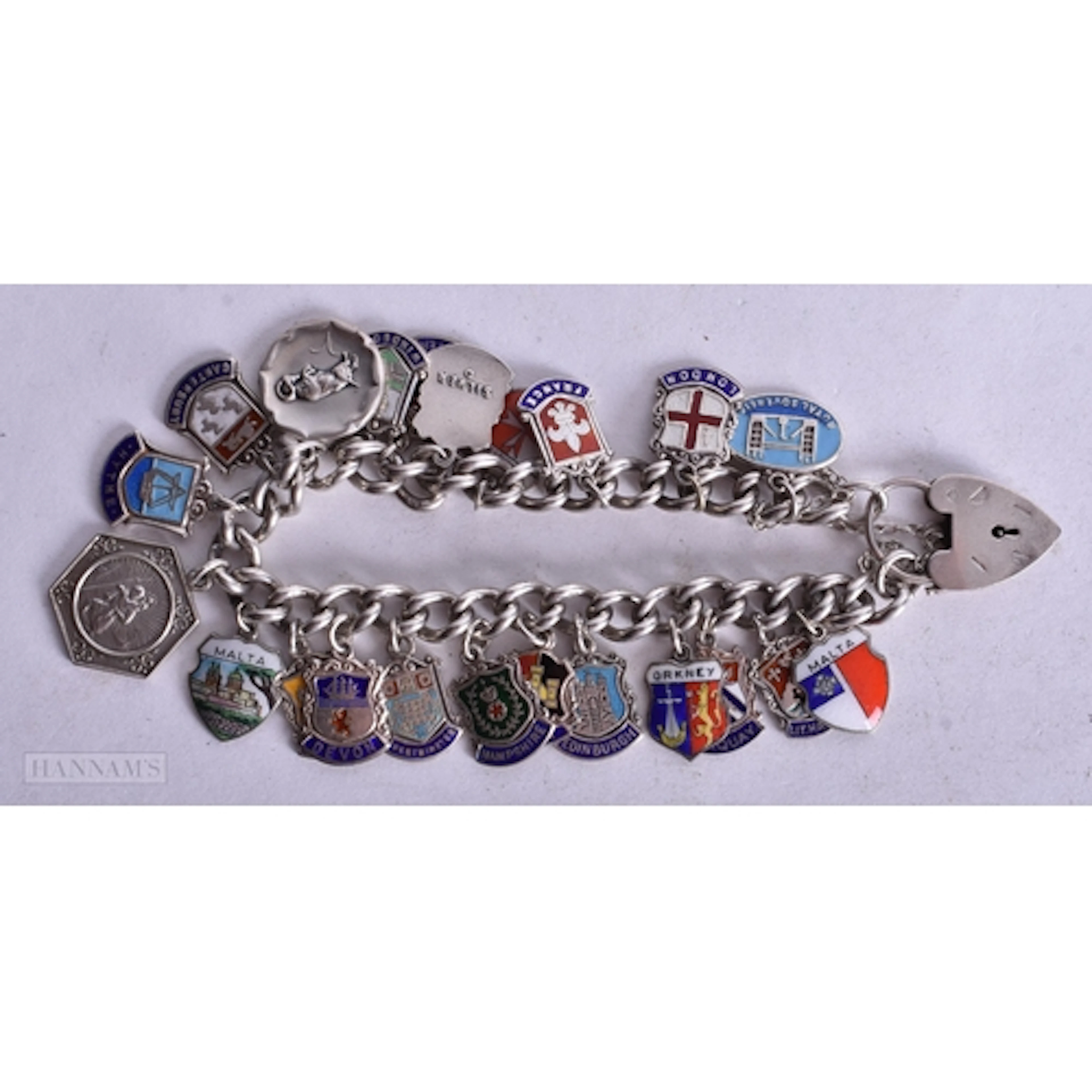 A SILVER CHARM BRACELET. 54 grams. 18 cm long.