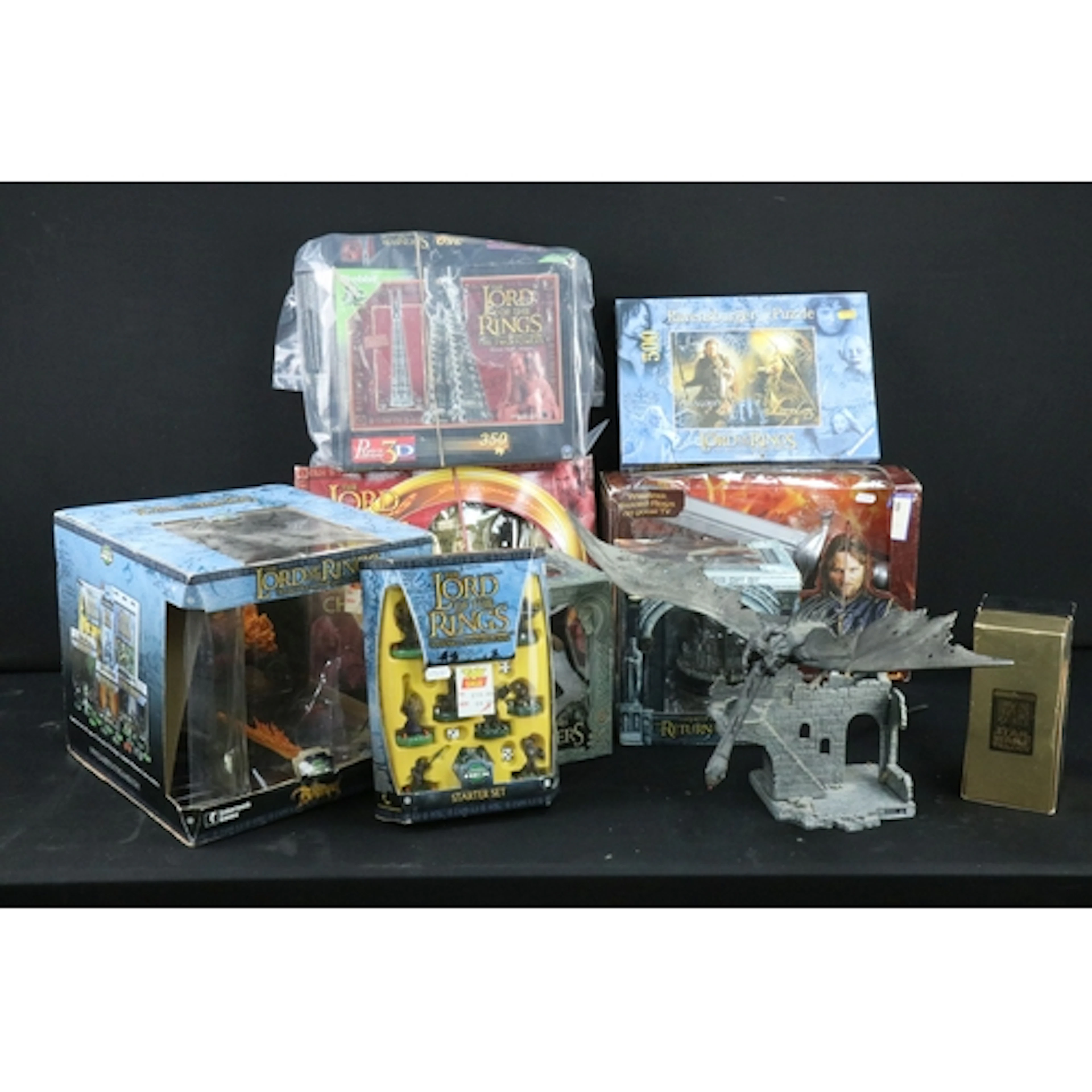 Seven boxed Lord of the Rings collectables and sets to inclu...