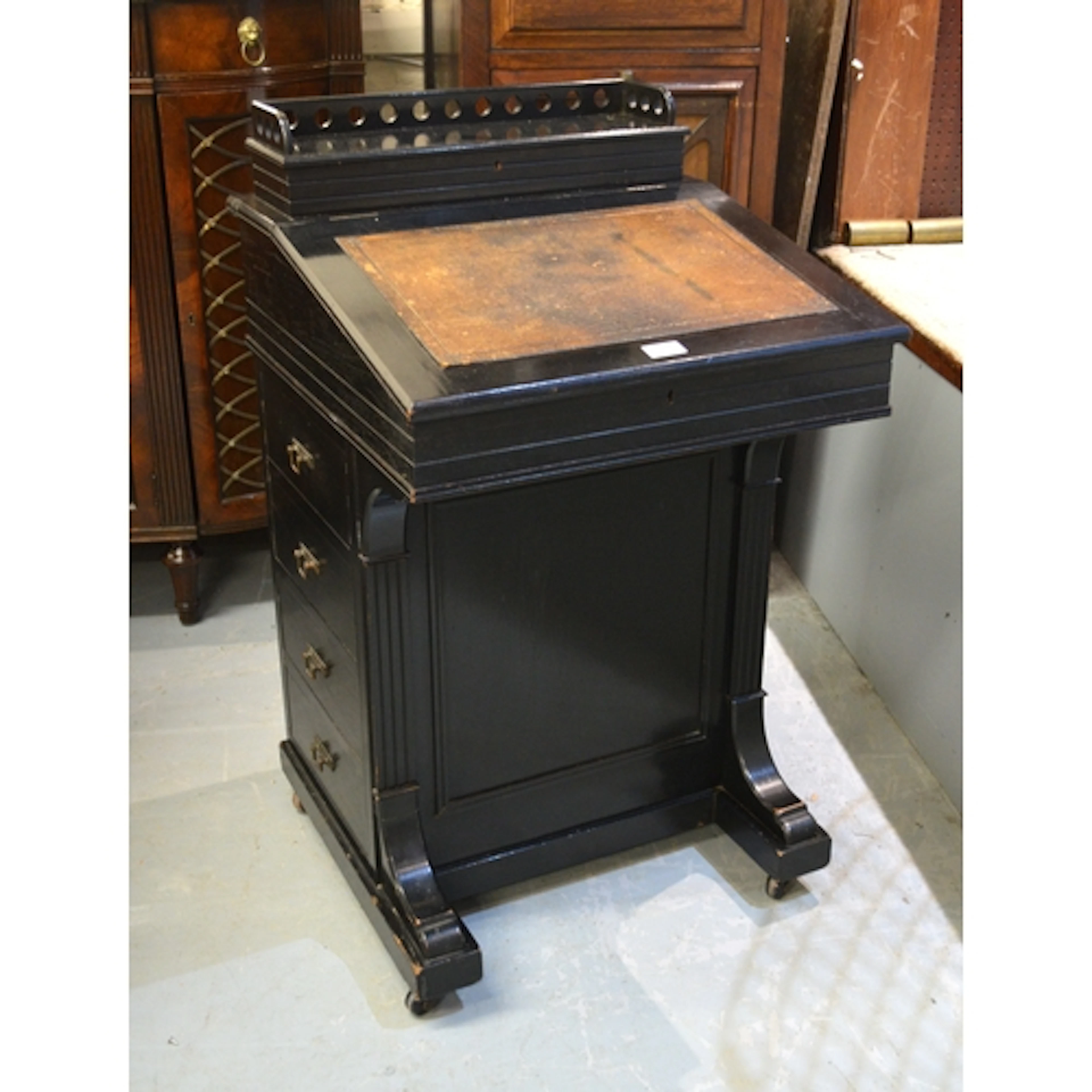 Aesthetic Movement ebonised Davenport with hinged sloping wr...