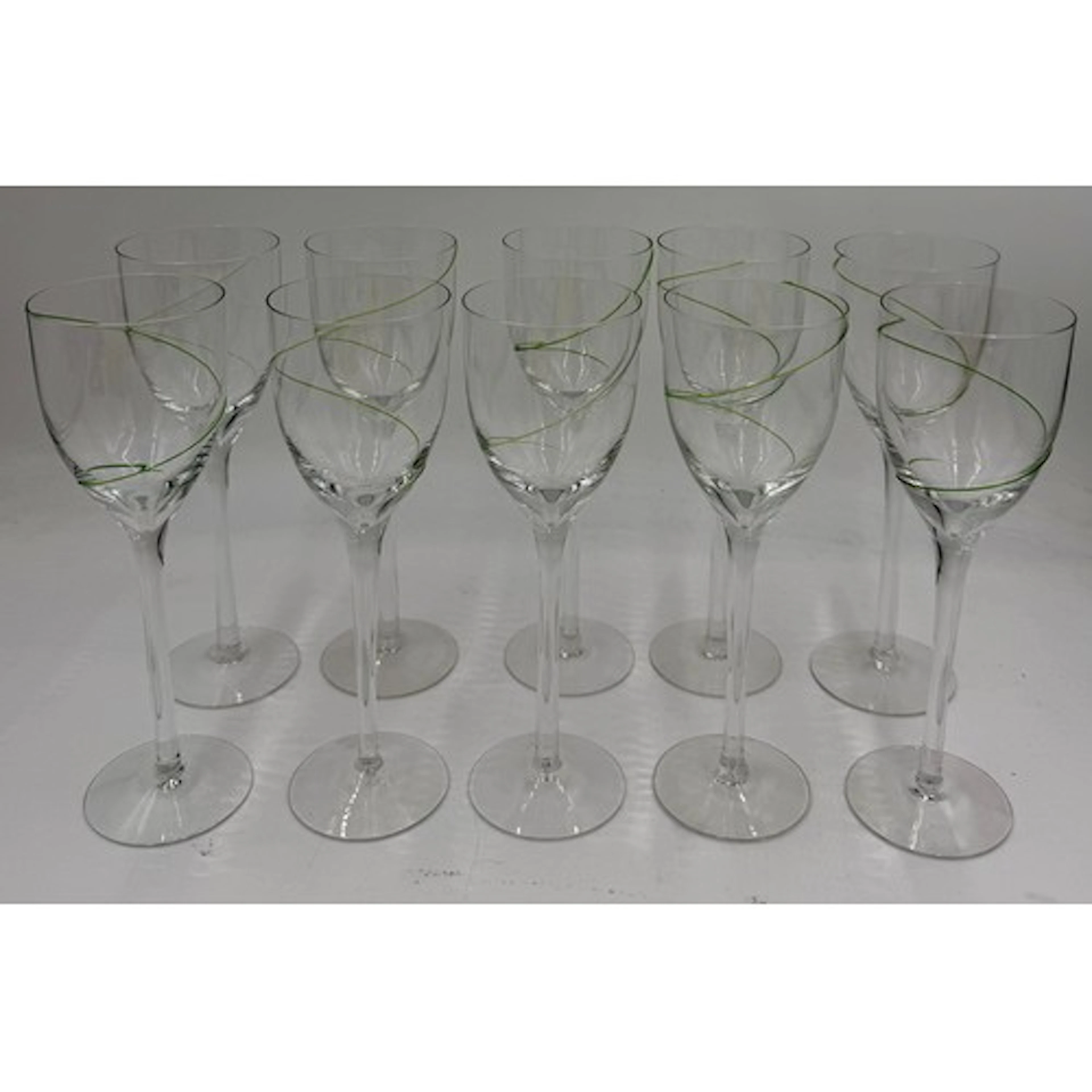 Ten Kosta Boda green line wine glasses. 21cm h.