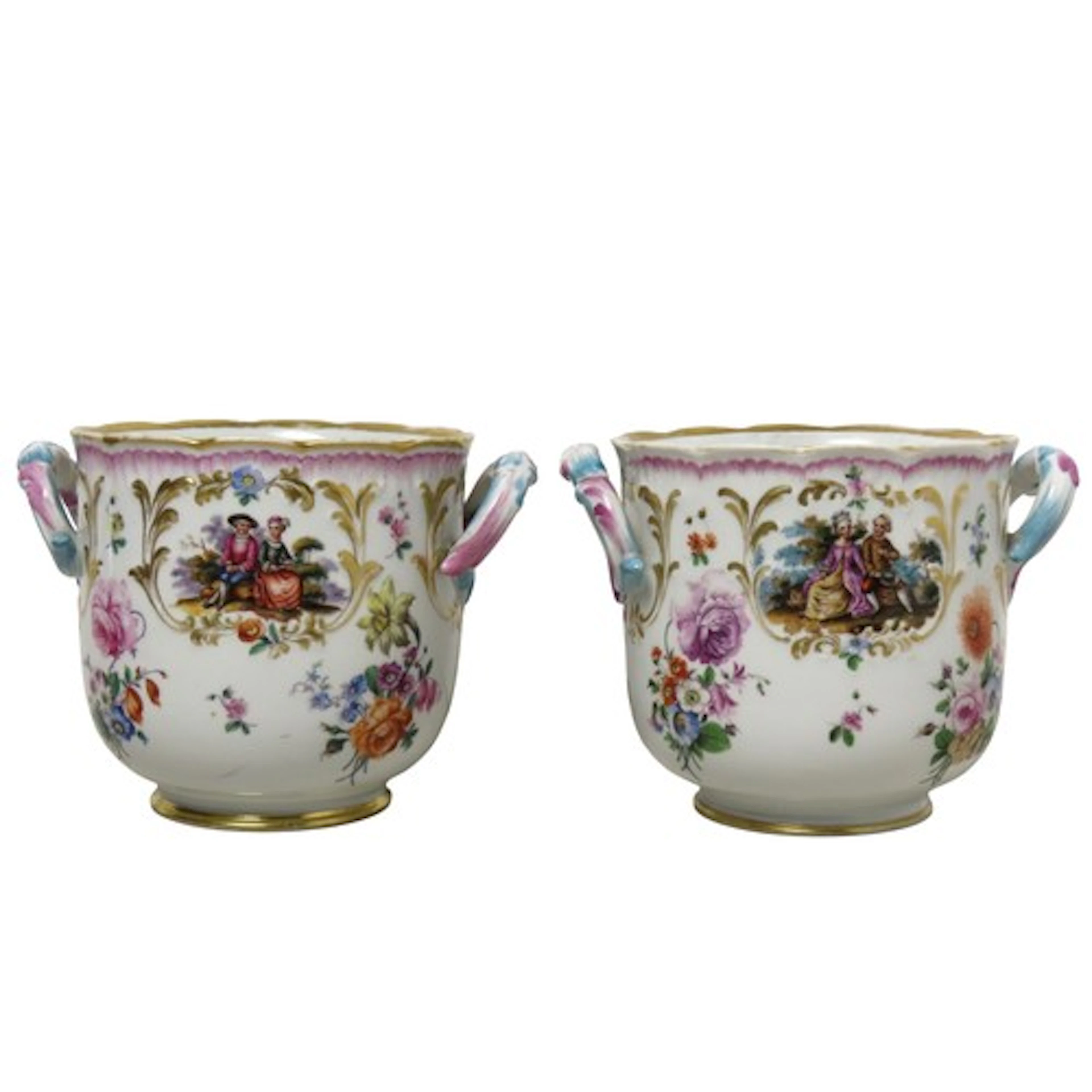 A PAIR OF DRESDEN STYLE TWIN-HANDLED CACHEPOTS decorated wit...