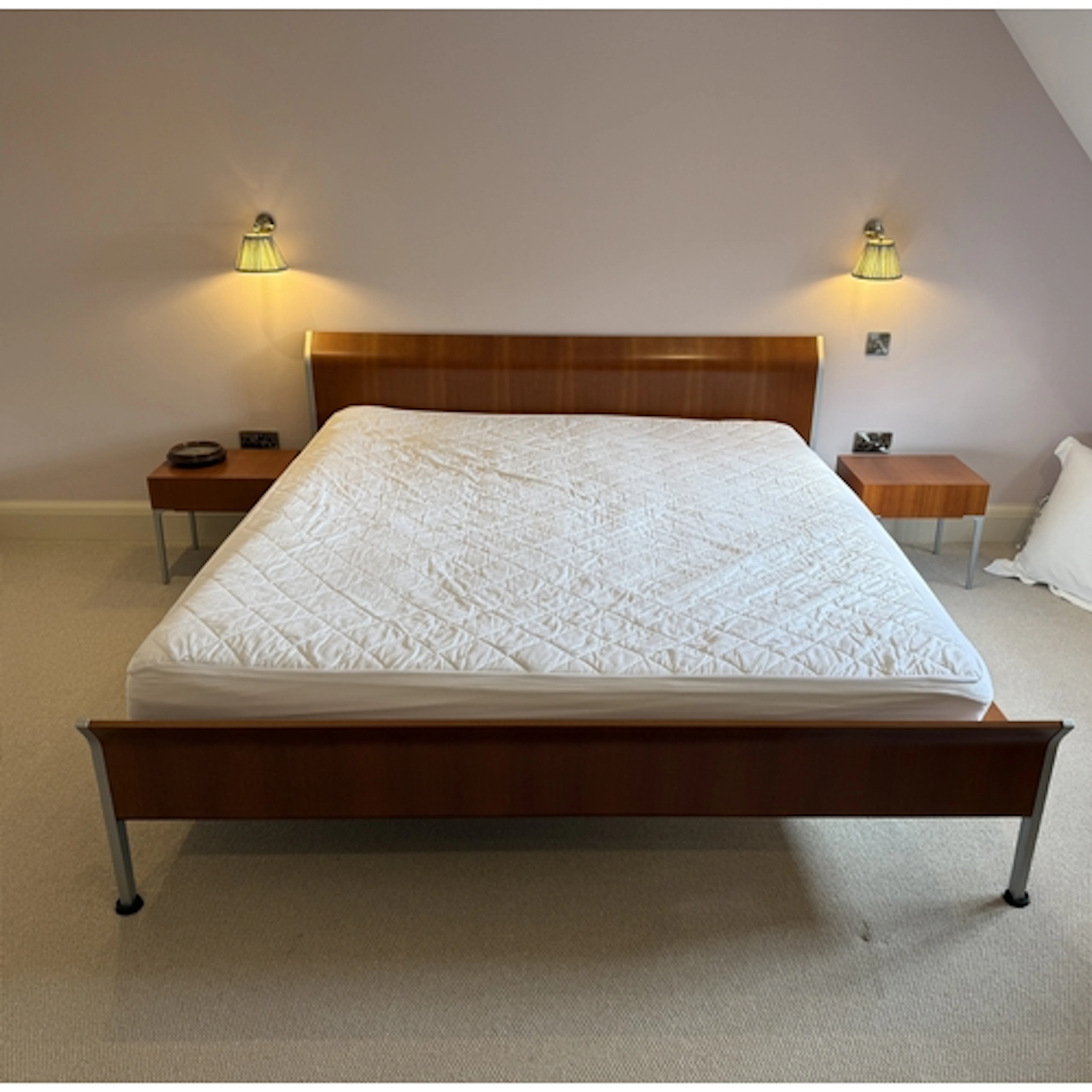 A Cassina cherry wood superking bed - probably from the Vola...