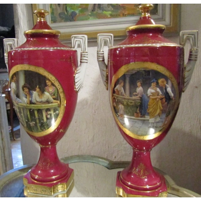 Pair of Continental Fine Porcelain Urns with Gilded Decorati...