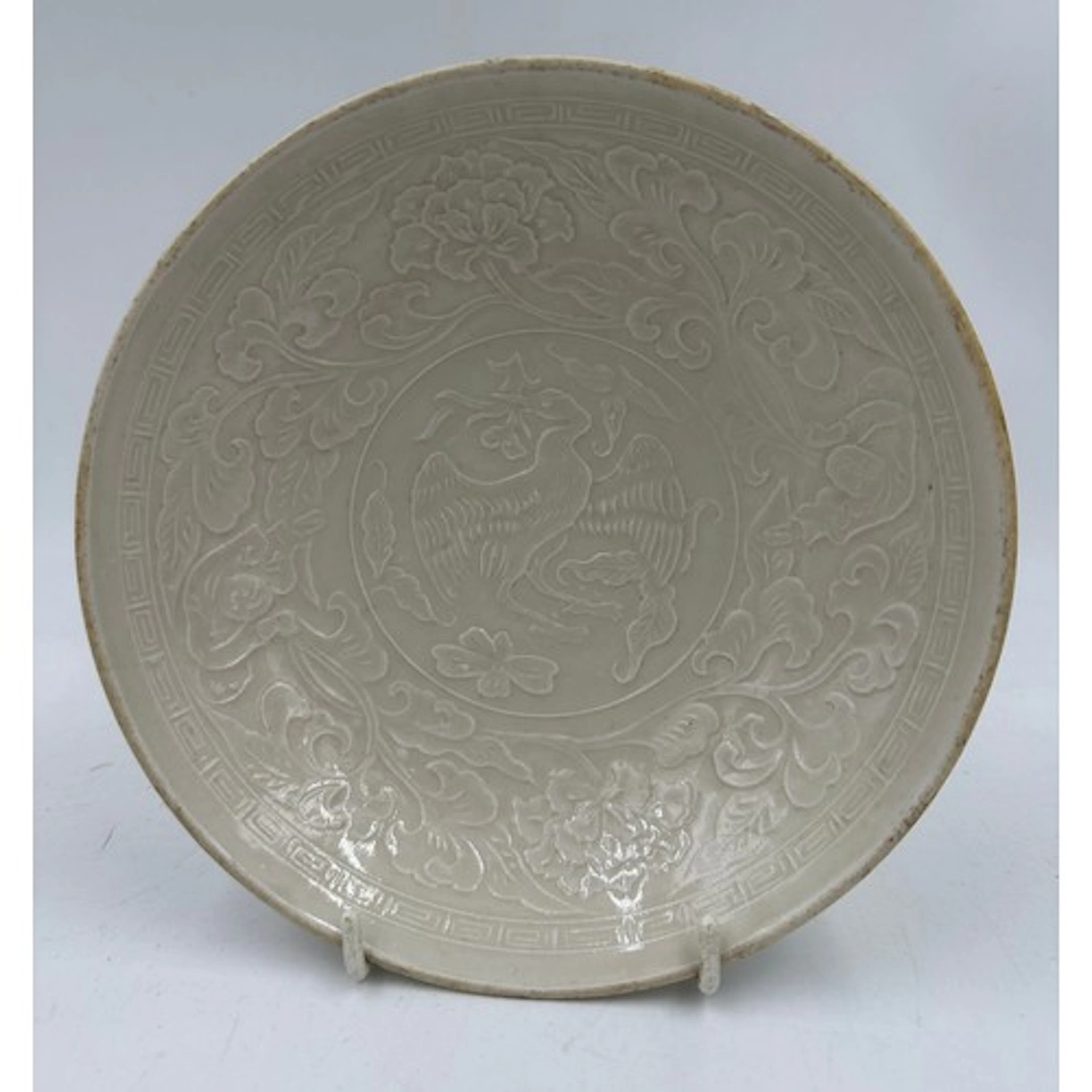 Dingyao type bowl, 18cm d. Moulded and glazed relief decorat...