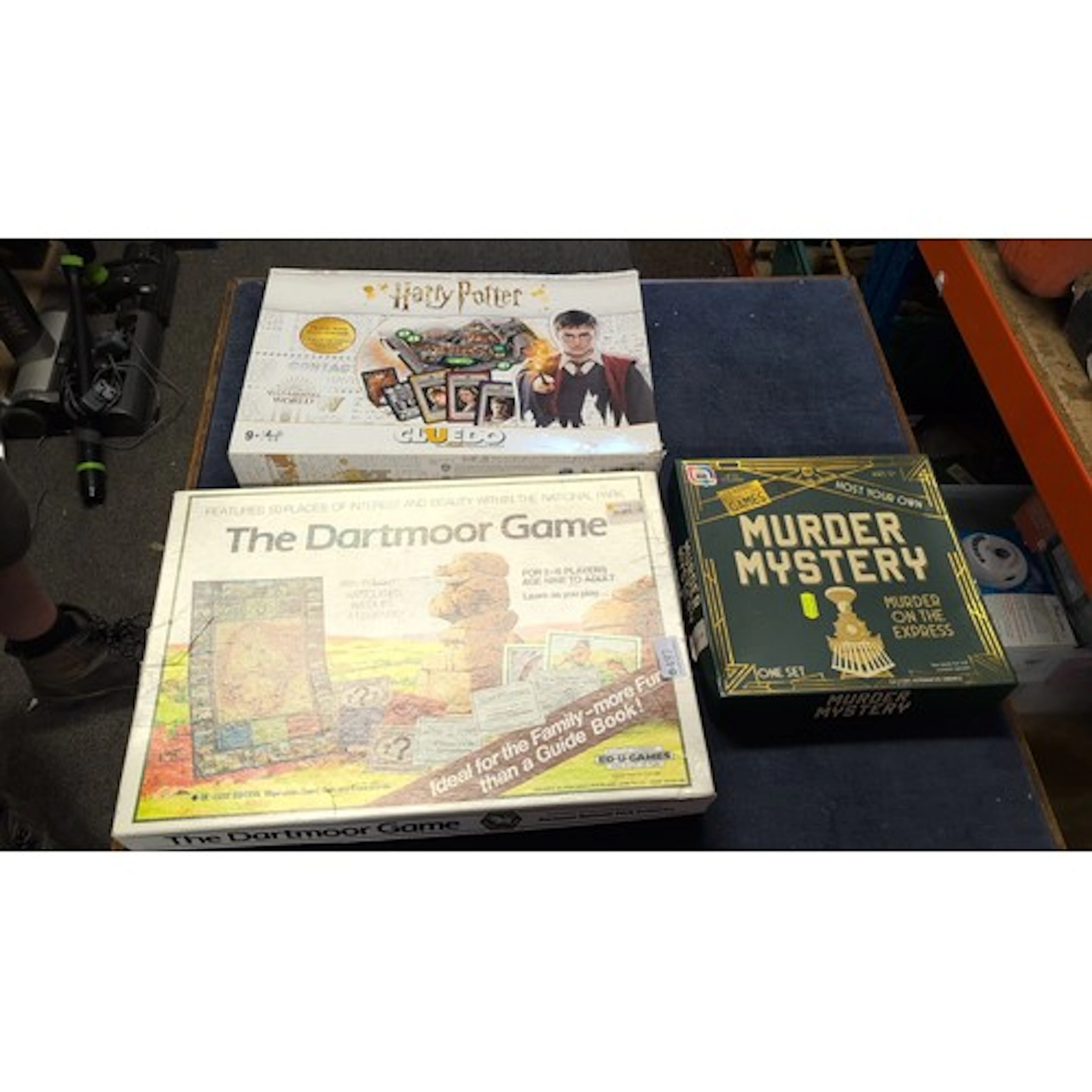 A group of boxed board games comprising Harry Potter Cluedo:...
