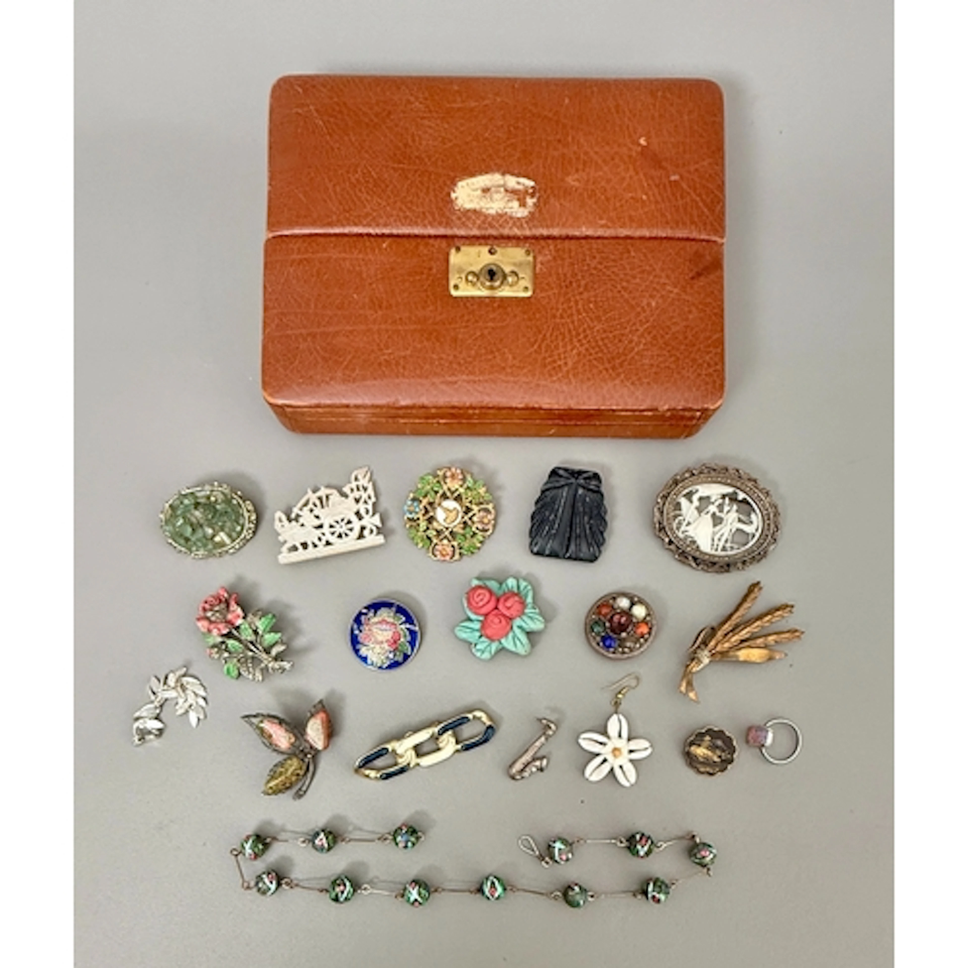 A small group of vintage costume jewellery - including an Or...