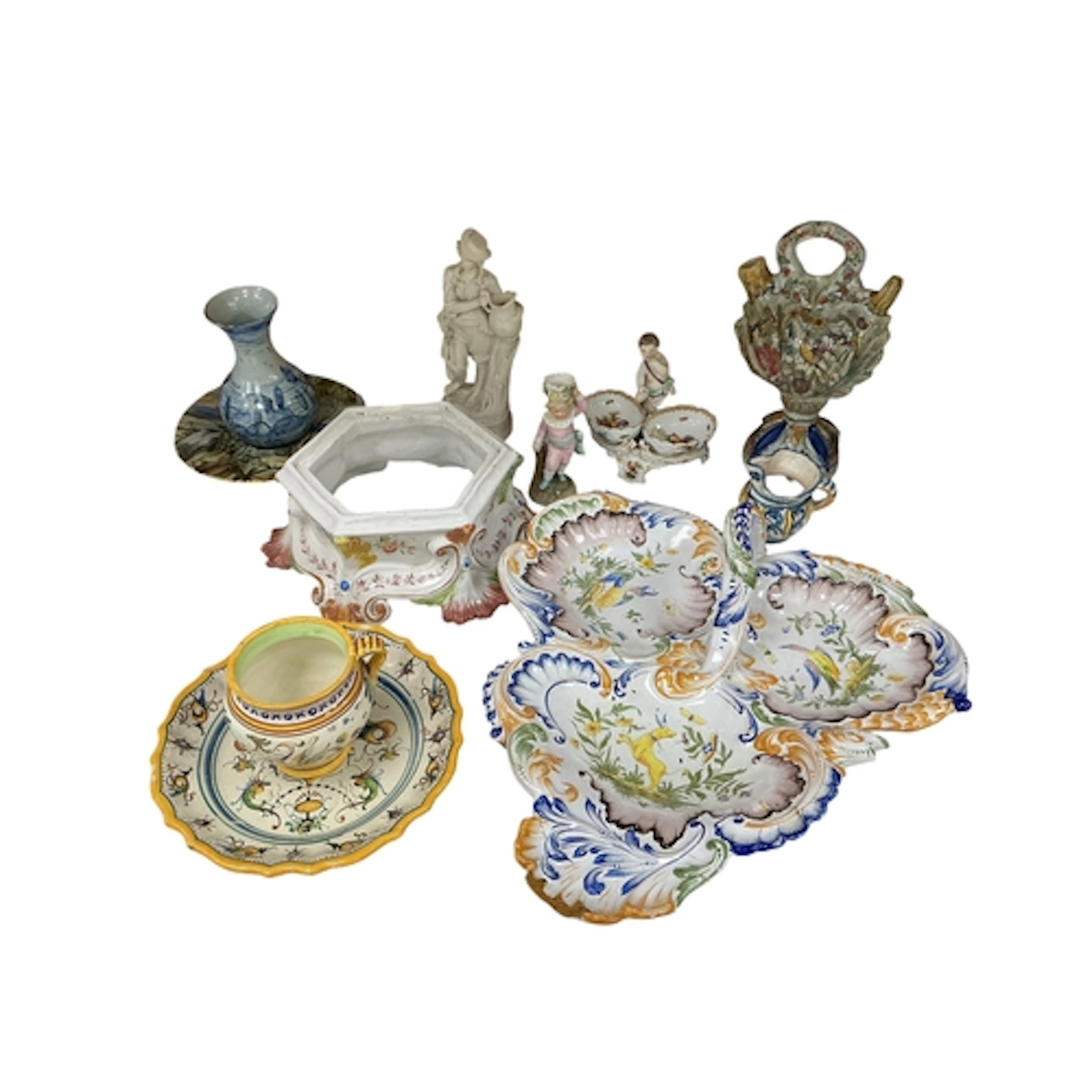 A group of Continental ceramics, comprising a French faïence...