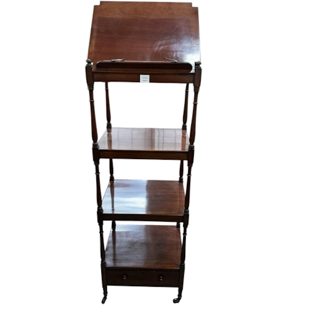 A early 19th century mahogany whatnot with hinged adjustable...