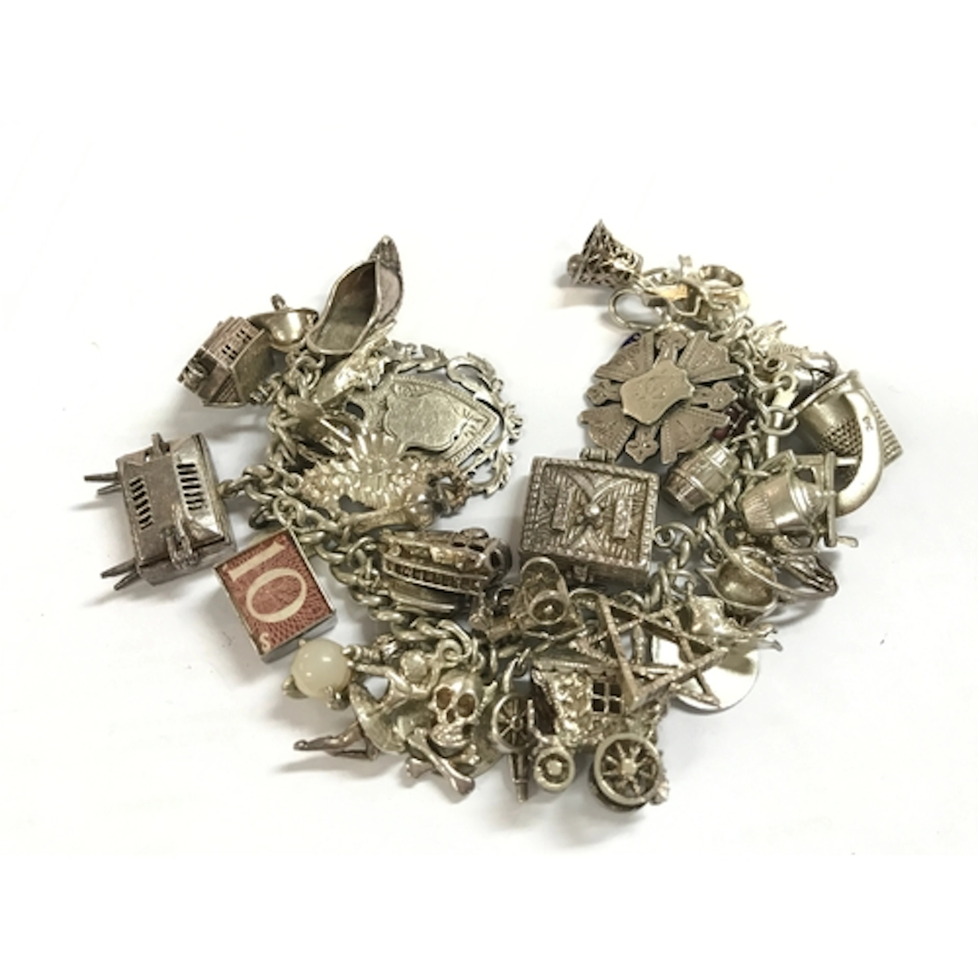A heavy silver charm bracelet 134g total weight