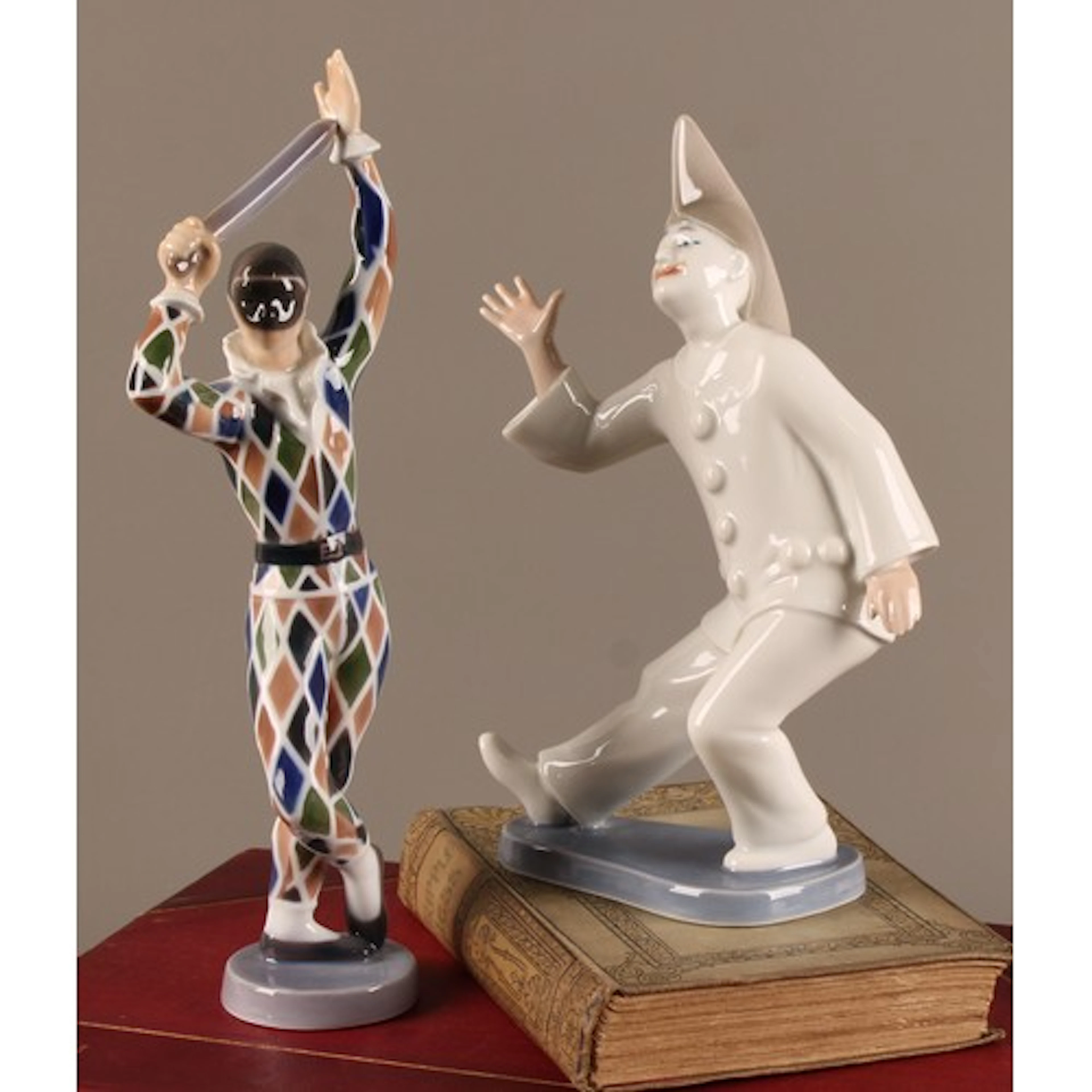A pair of Bing & Grøndahl figures, Pierrot 2353 and Harlequi...