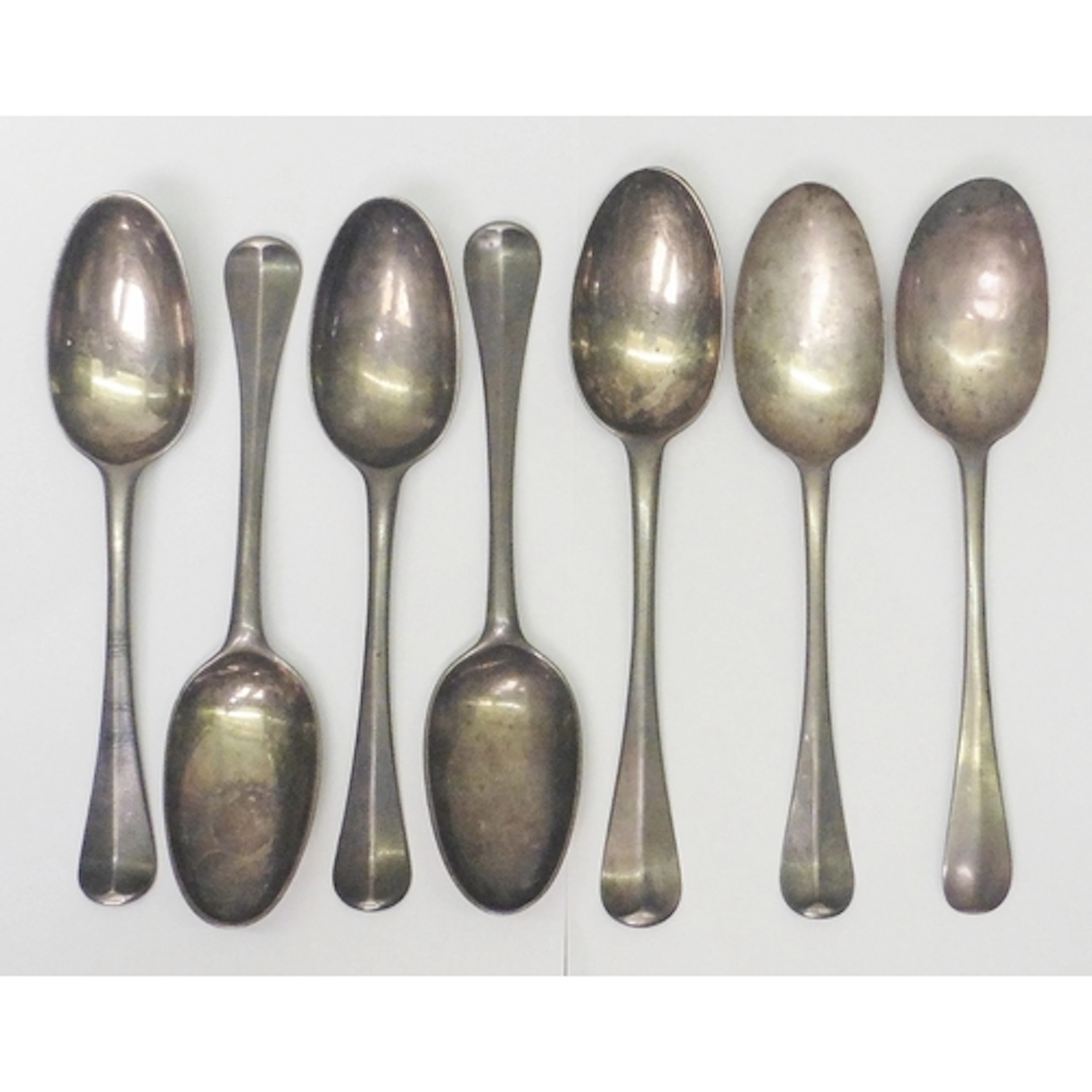 A set of four matching early 18th cent rat tail table spoons...