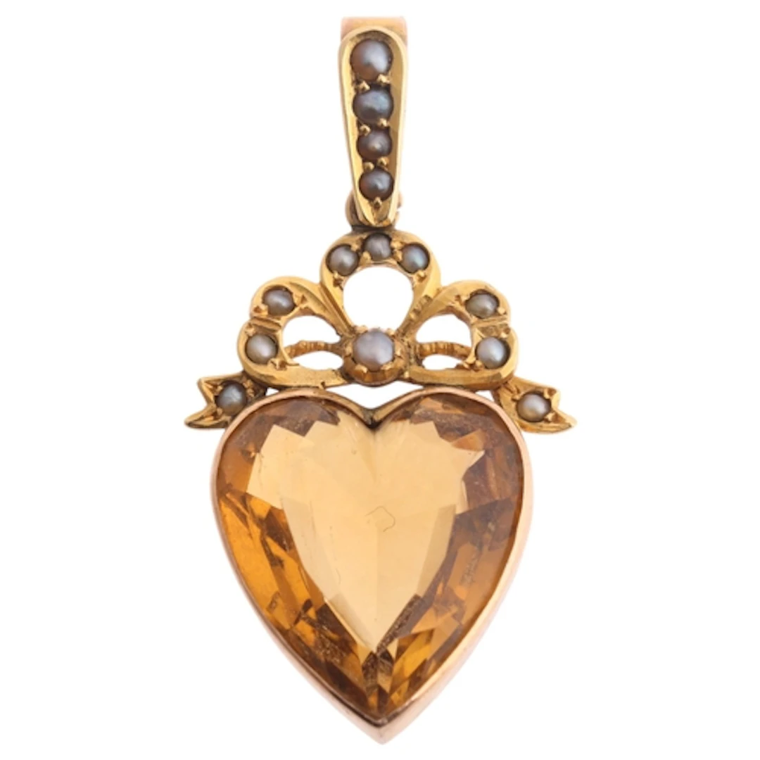 An Edwardian 9ct rose gold citrine and split pearl heart pen...