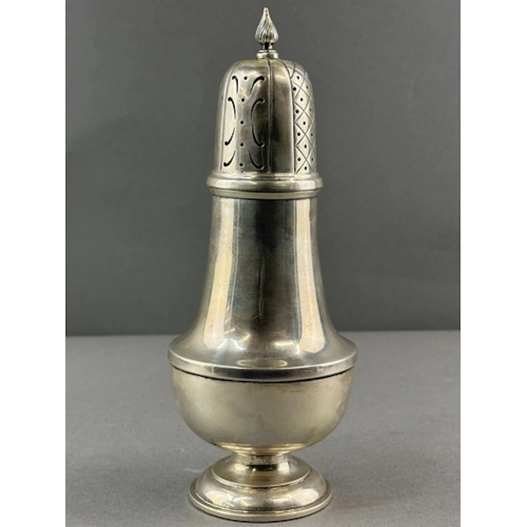 Silver: a caster of baluster form by William Hutton, Birming...