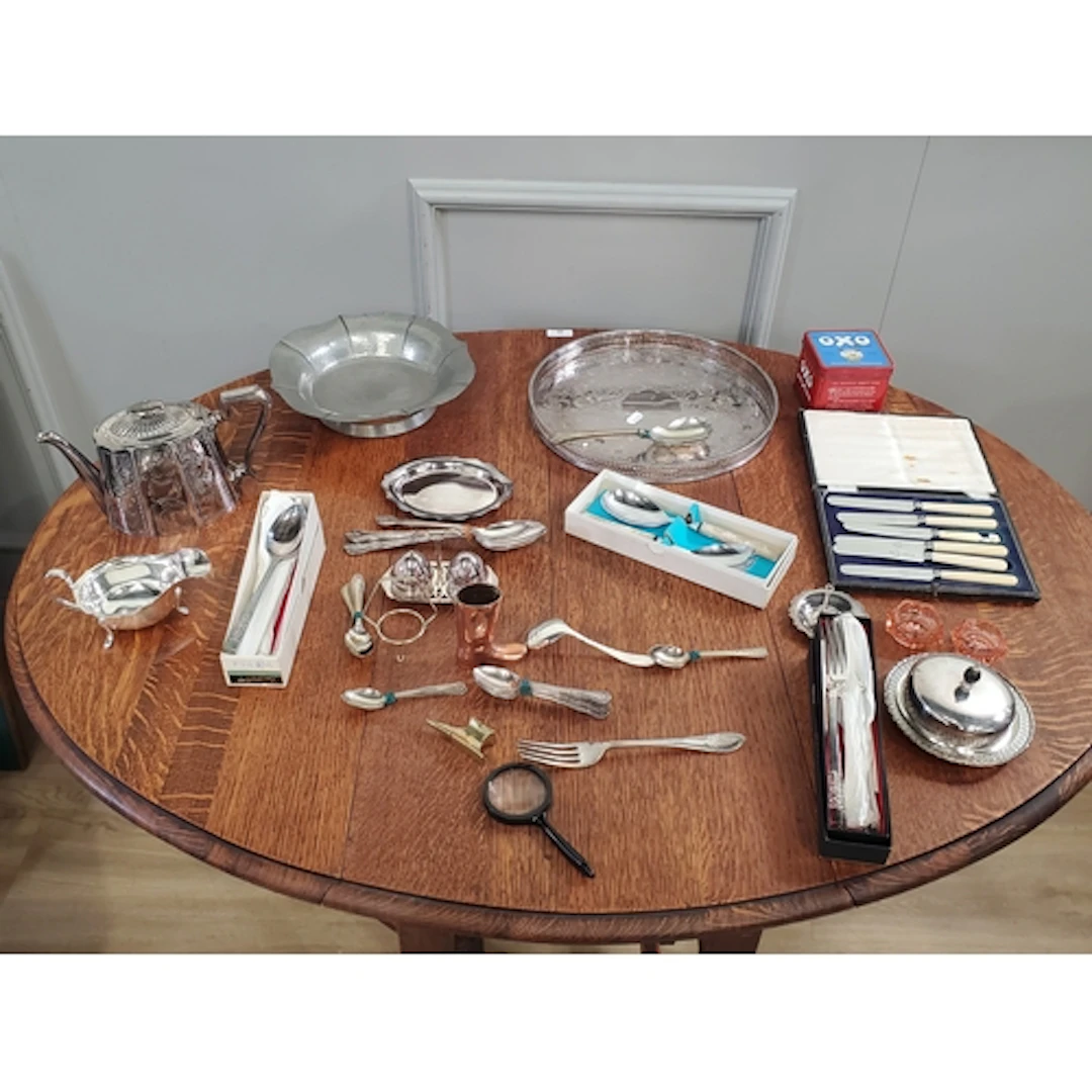 A box of assorted plated Cutlery, pots etc (R3).