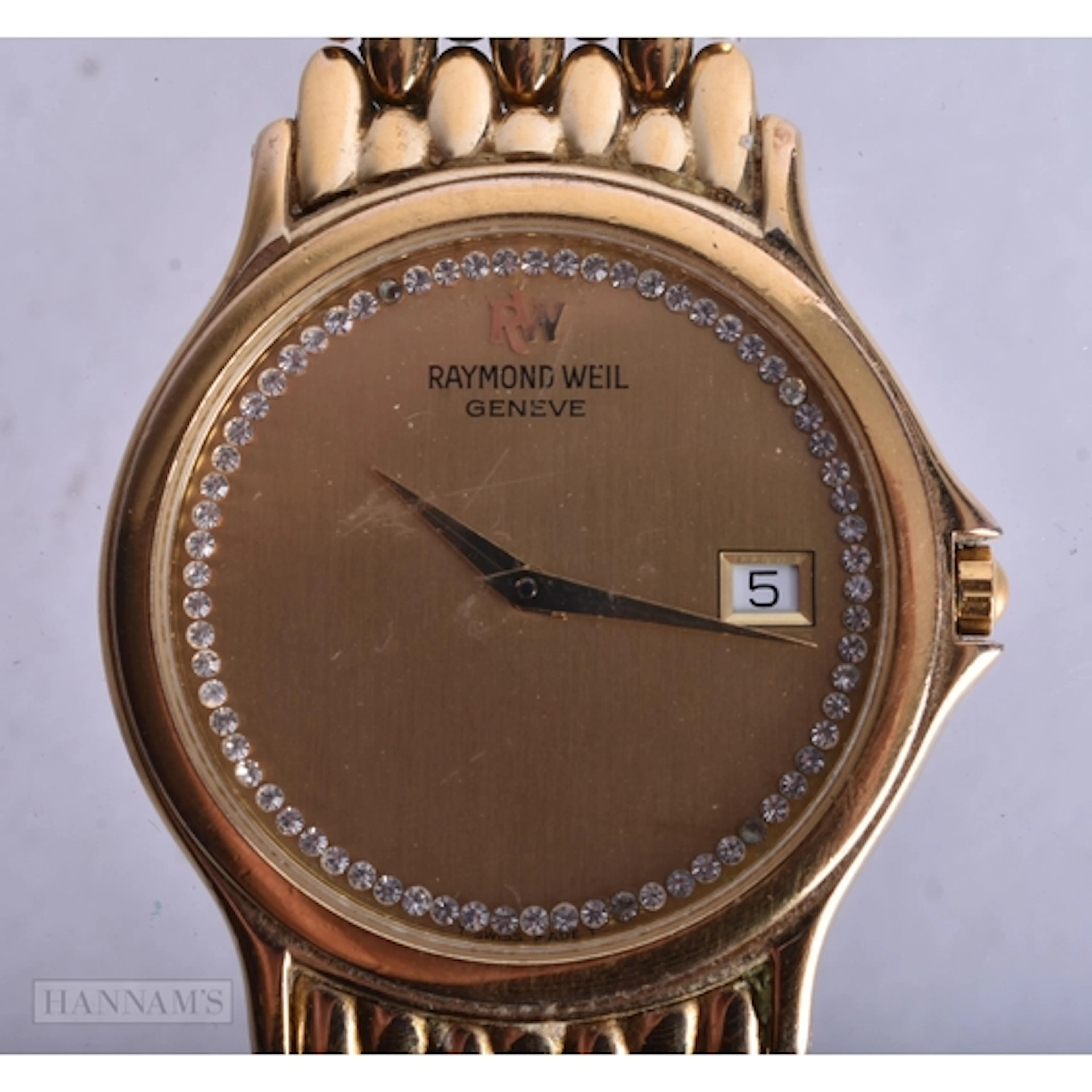 A RAYMOND WEIL WRIST WATCH. Untested. 3 cm wide.