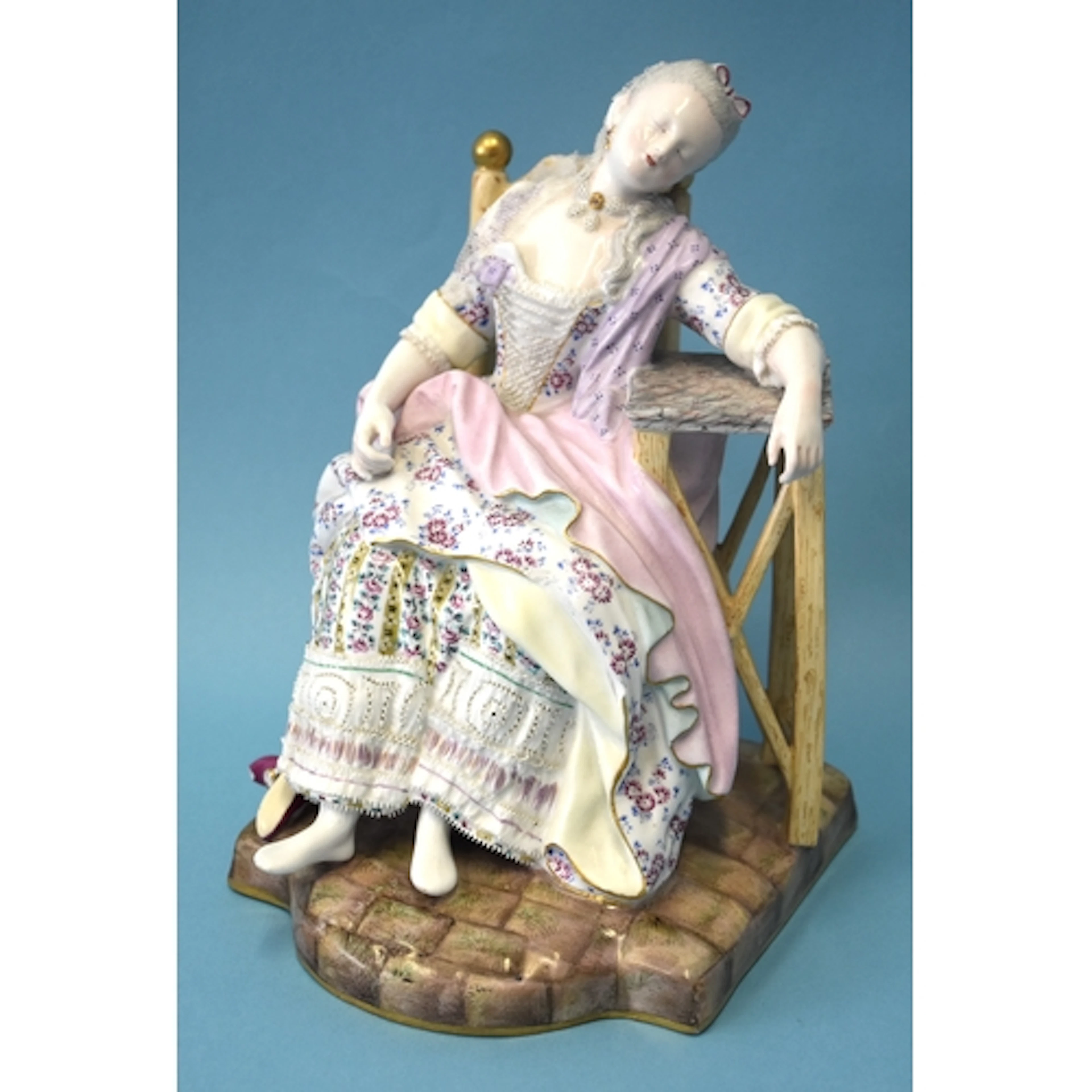 A late-19th century Meissen figure group depicting a woman r...